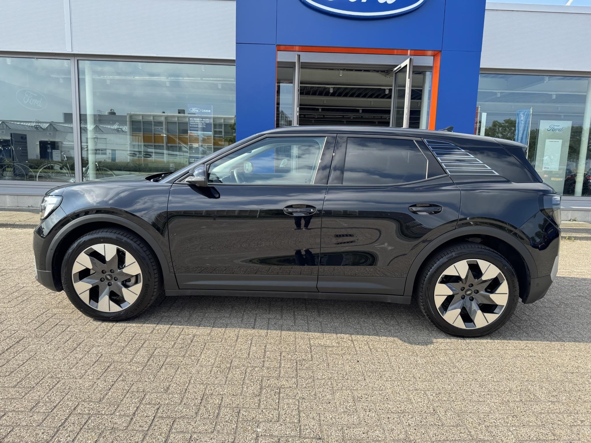 Ford Explorer Premium Extended Range AWD 79 kWh 11.000 KM |, Auto's, Automaat, Zwart, Vierwielaandrijving, SUV of Terreinwagen