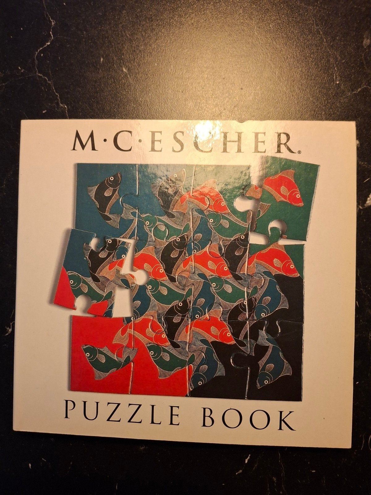 M.C. Escher Puzzelboek - 8 briljante puzzels, Ophalen of Verzenden