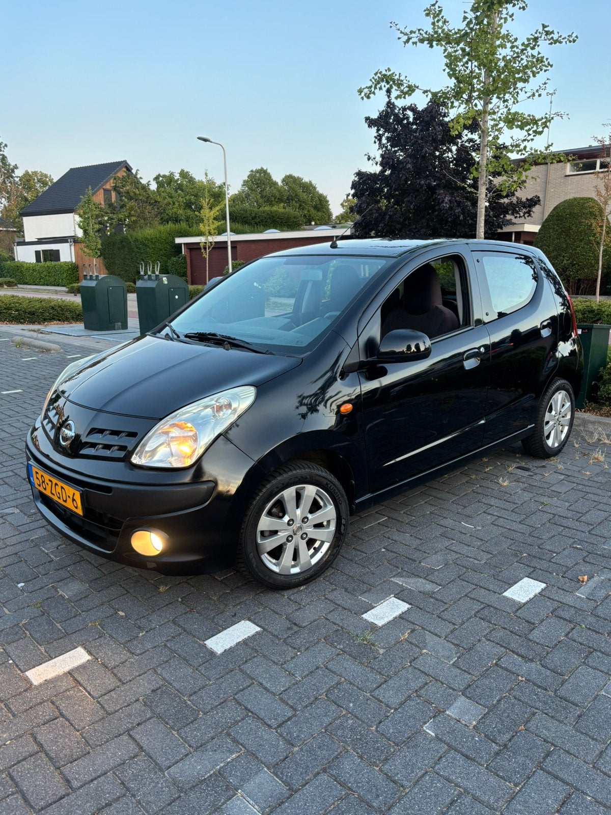 Nissan Pixo 1.0 50KW 5D 2012 Zwart Airco NAP Servicehistorie, Voorwielaandrijving, Euro 5, Stof, 4 stoelen