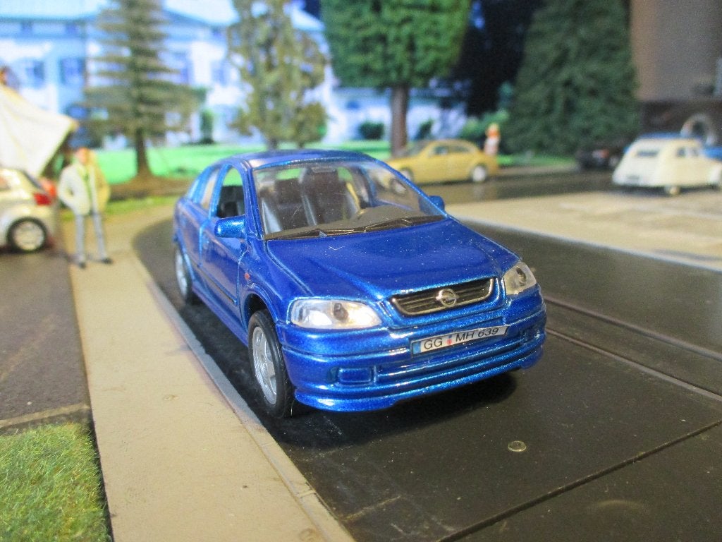 1:34 Opel Astra G - Welly blauwmetallic, Ophalen of Verzenden, Zo goed als nieuw, Auto, Overige merken
