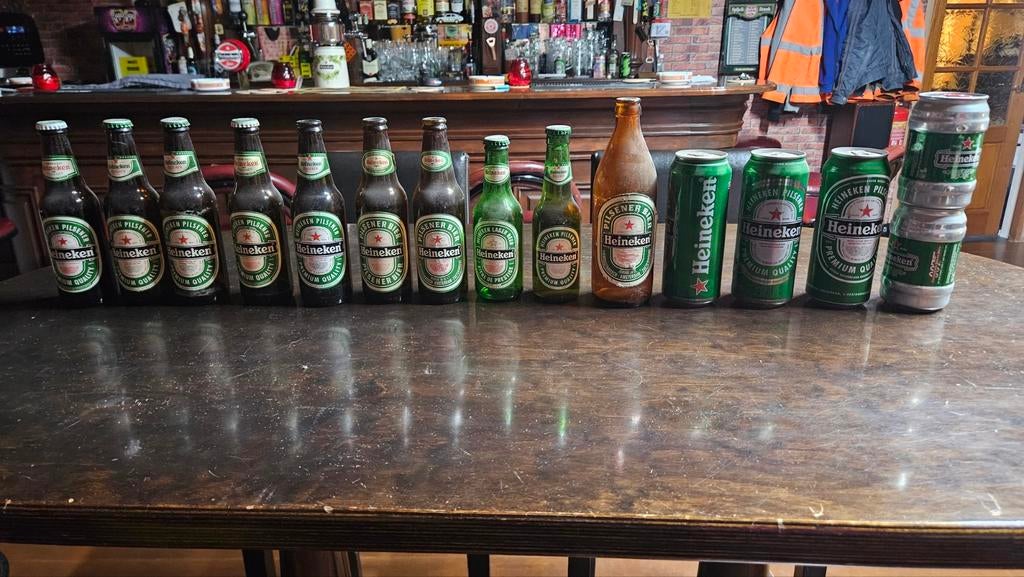 Diverse oude Heineken bier flesjes en blikjes., Ophalen, Gebruikt, Flesje(s), Heineken