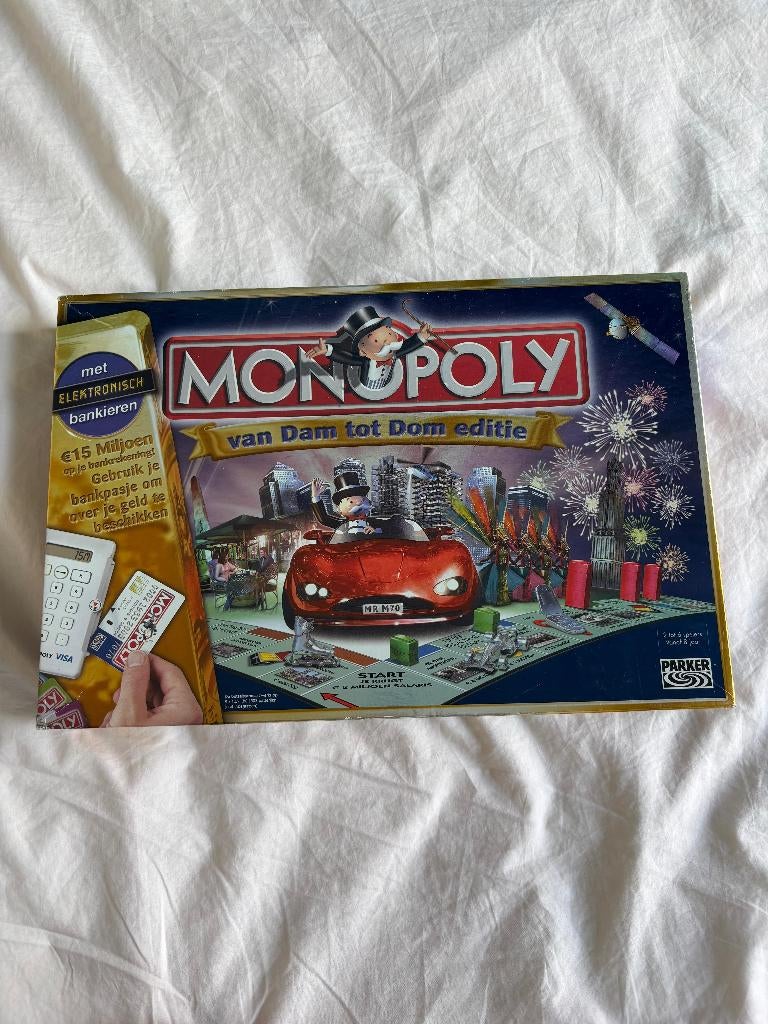 Monopoly van Dam tot Dom editie, Hobby en Vrije tijd, Gezelschapsspellen | Bordspellen, Vijf spelers of meer, Ophalen of Verzenden