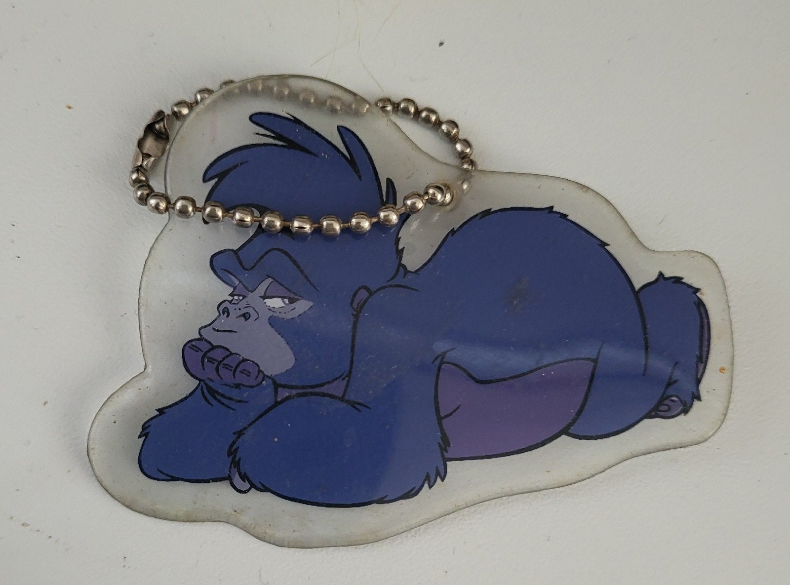 Sleutelhanger met paarse aap / gorilla figuur, Ophalen of Verzenden, Gebruikt, Knuffel of Figuurtje