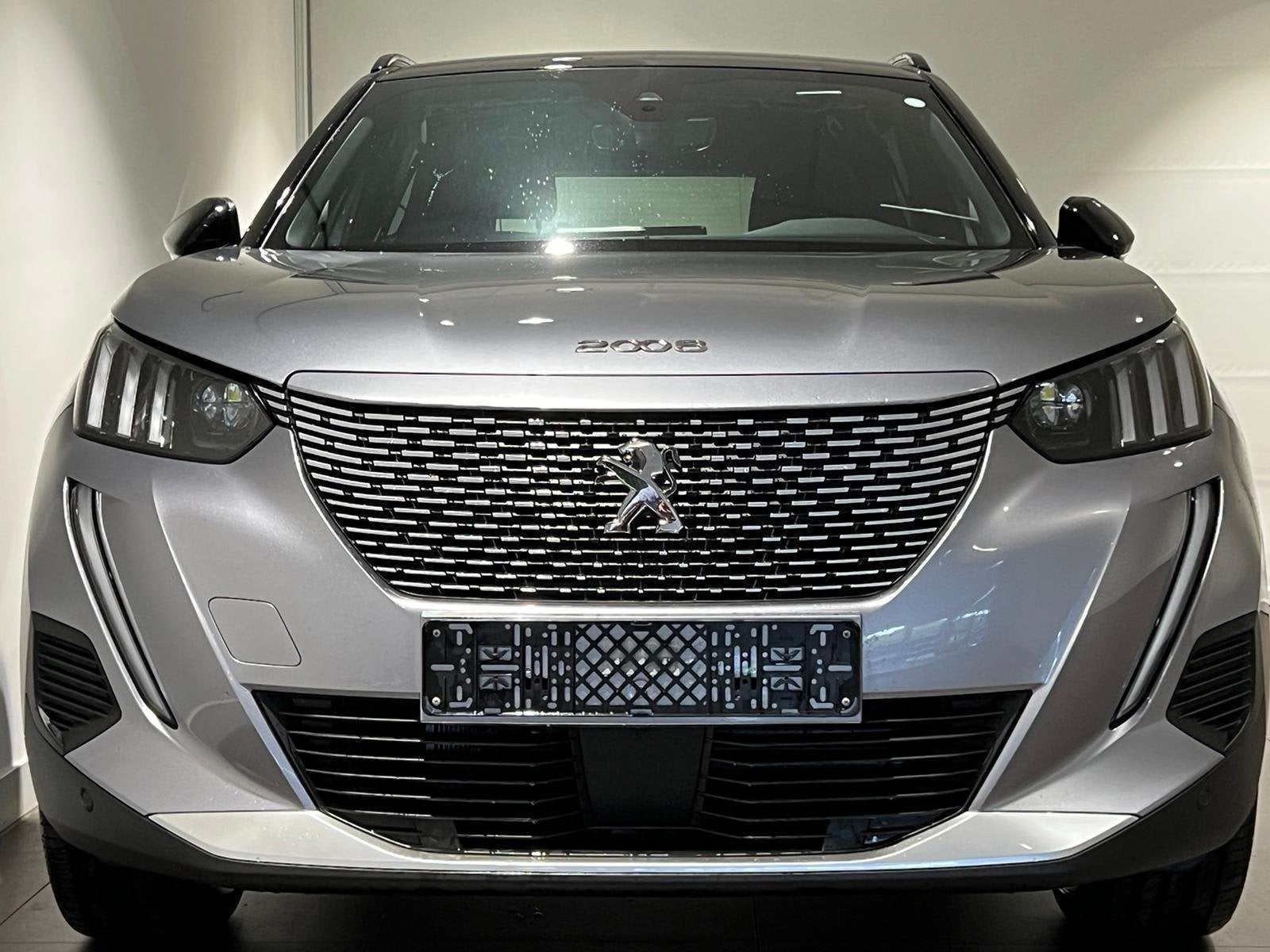Peugeot e-2008 EV GT 50 kWh Climate Control | Elek. Verstelb, Auto's, 136 pk, Gebruikt, Leder en Stof, Origineel Nederlands