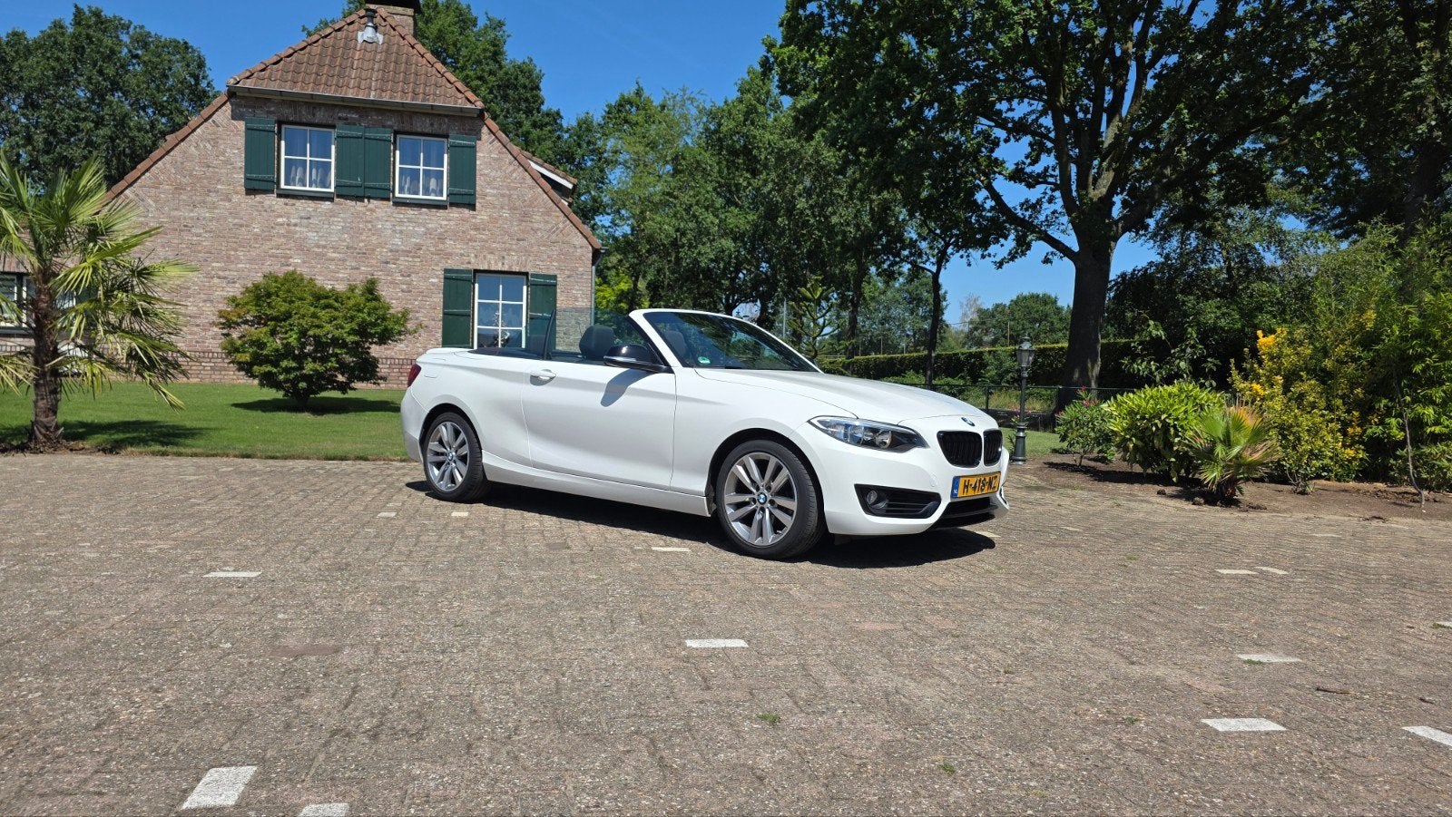 BMW 2-Serie 1.5 218IA 100KW Cabrio Aut8 2015 Wit, Automaat, Cabriolet, 4 stoelen, Wit