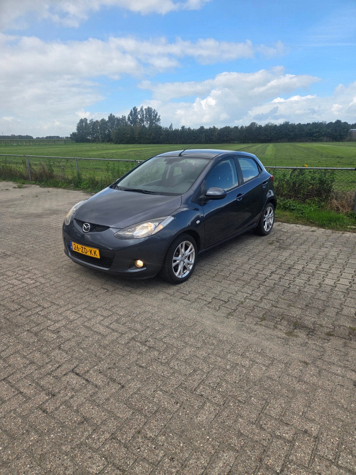 Mazda 2 1.3 63KW 5DRS 2008 Grijs, Auto's, Voorwielaandrijving, 31 €/maand, 4 cilinders, Origineel Nederlands