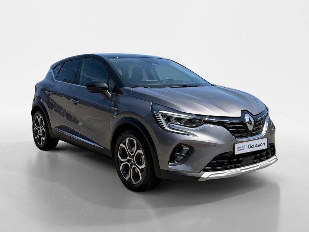 Renault Captur 145PK E-Tech Hybrid Intens Automaat | 9,3" Na, Auto's, Renault, 12 maanden, Gebruikt, Leder en Stof, Hybride Elektrisch/Benzine