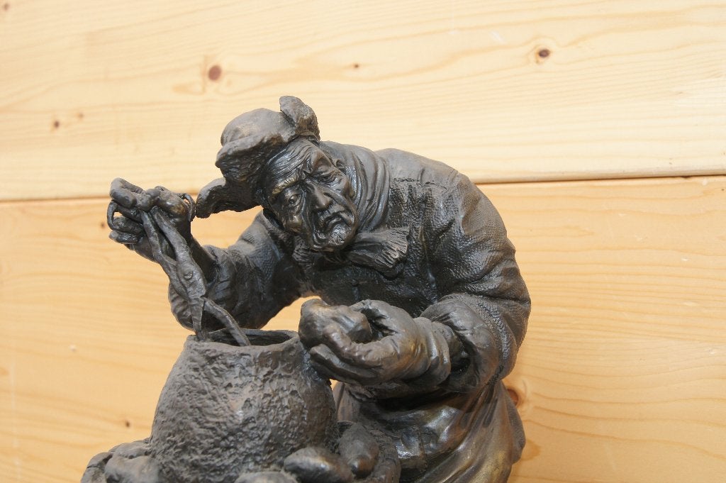 Man die aarappels schild  ( Brons, Ophalen of Verzenden, Brons, Beeld