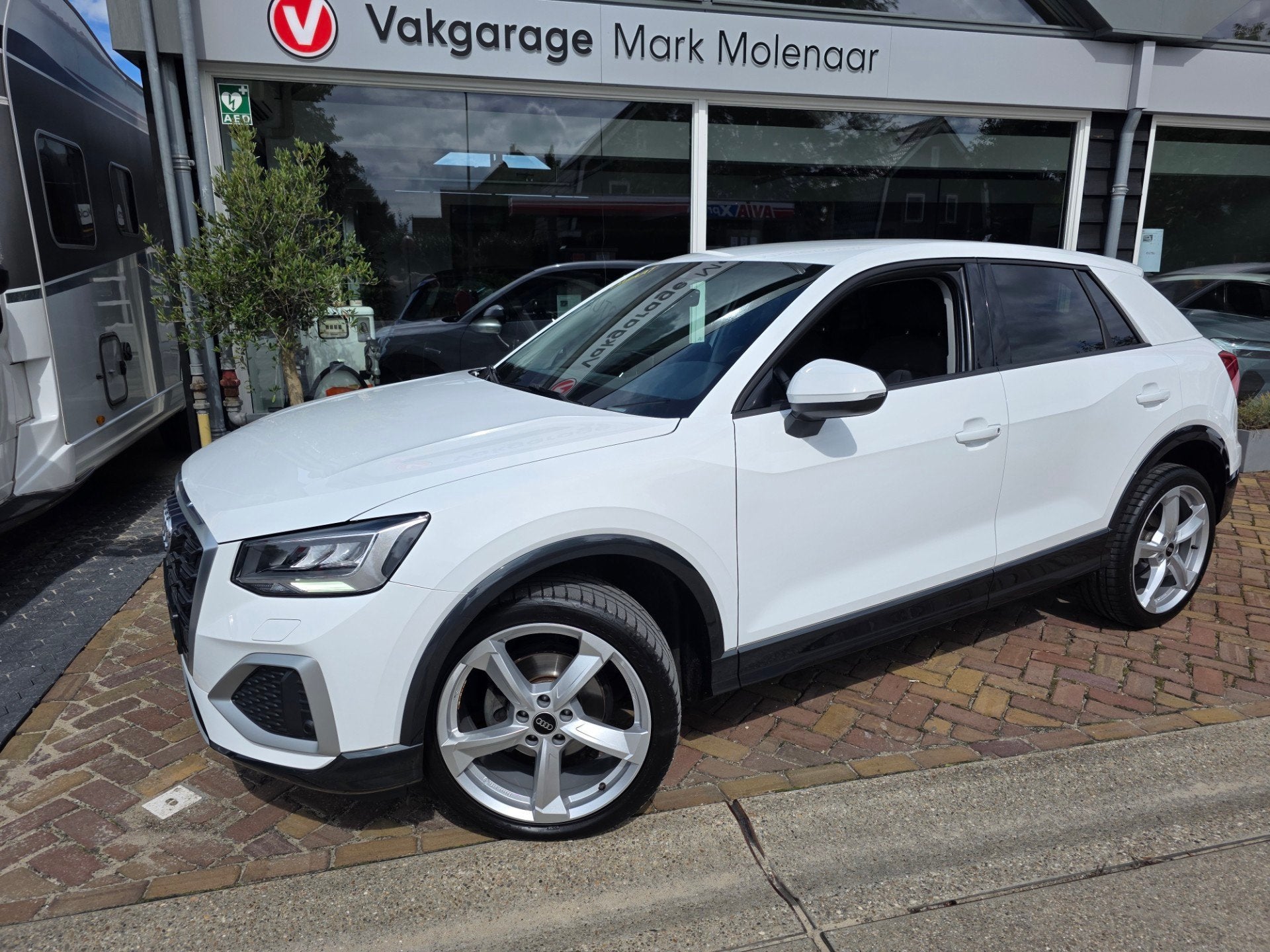 Audi Q2 35 TFSI S Edition,leuke auto met zeer weinig km, Auto's, 4 cilinders, 150 pk, Automatische klimaatregeling, Leder en Stof