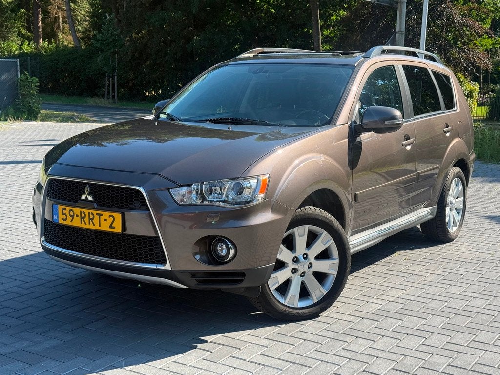 Mitsubishi Outlander 2.0 Instyle/Automaat/Airco/Cruise/Navi/, Auto's, Mitsubishi, 4 cilinders, Bruin, Bi-Xenon koplampen, Bedrijf