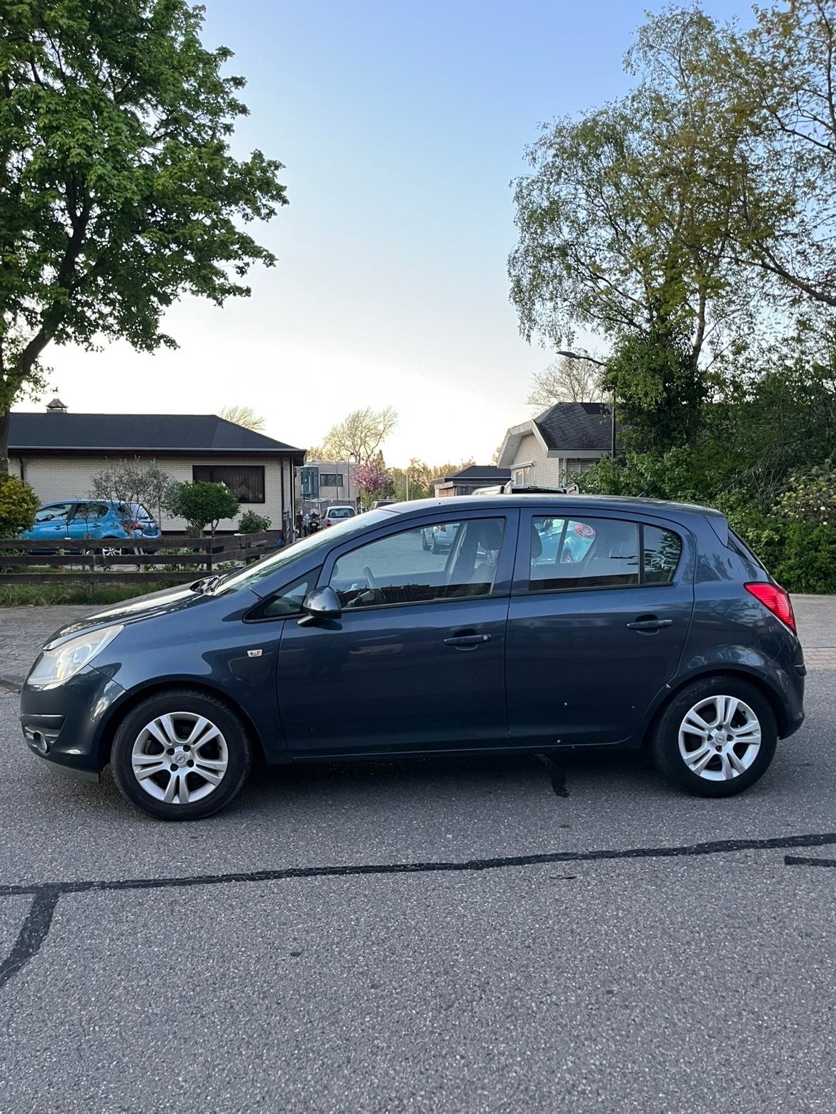 Opel Corsa 1.2 16V 5D 2009 Grijs, Voorwielaandrijving, Parkeersensor, 4 cilinders, 1229 cc
