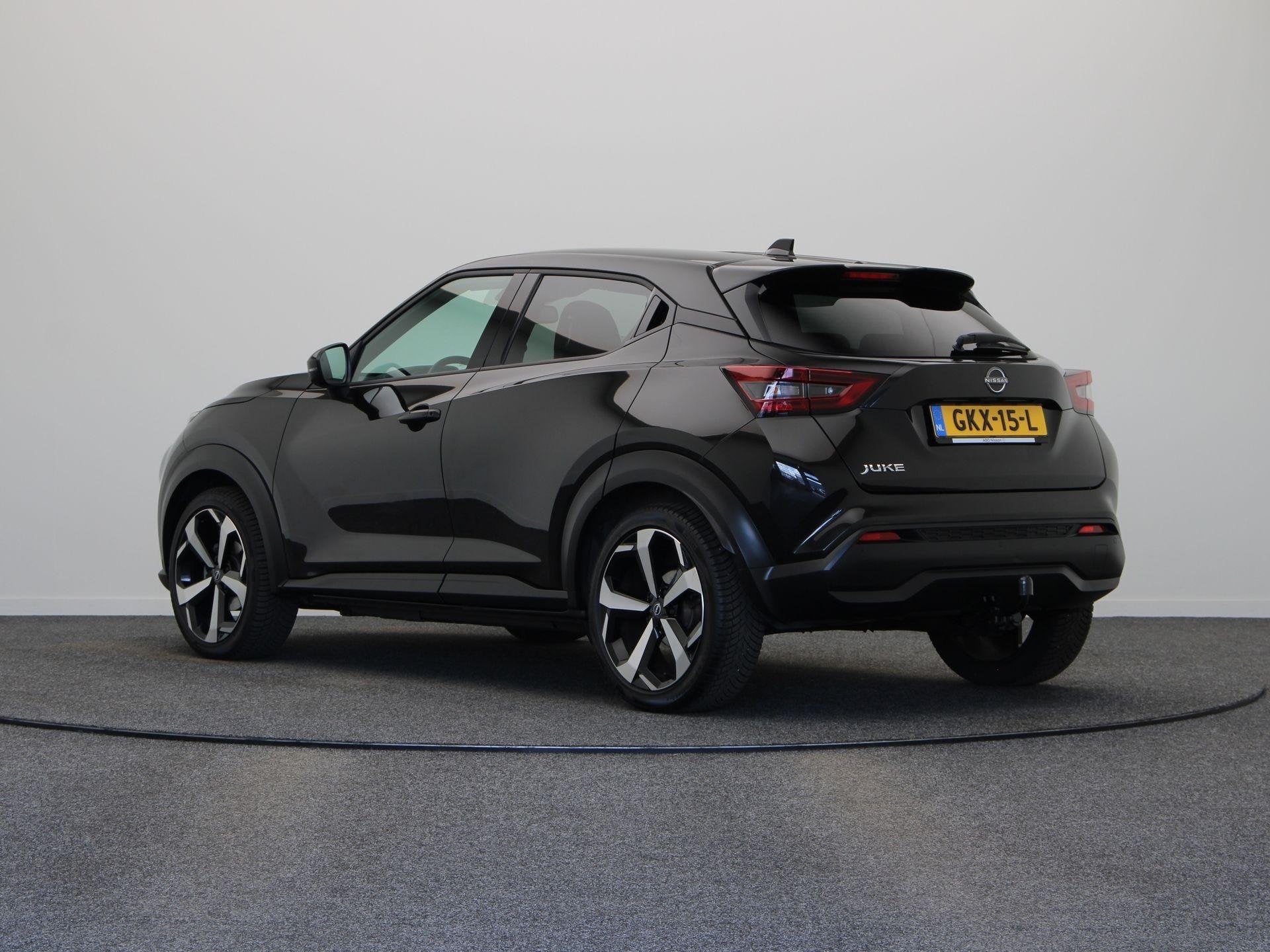 Nissan Juke 1.0 DIG-T Tekna | Leer | Trekhaak | Bose audio |, Auto's, Euro 6, Leder en Stof, Zwart, Bedrijf