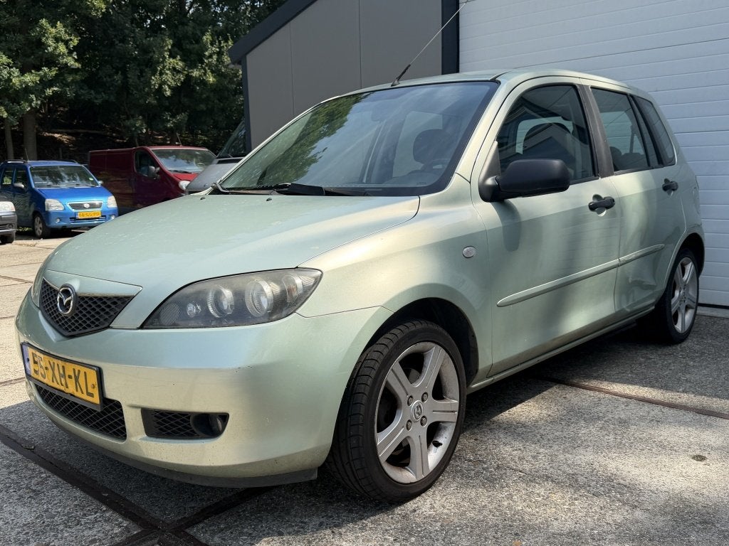 Mazda 2 1.4 Luxury Edition | Airco | 1eig! | NAP |, Auto's, 1025 kg, Gebruikt, Zwart, 4 cilinders