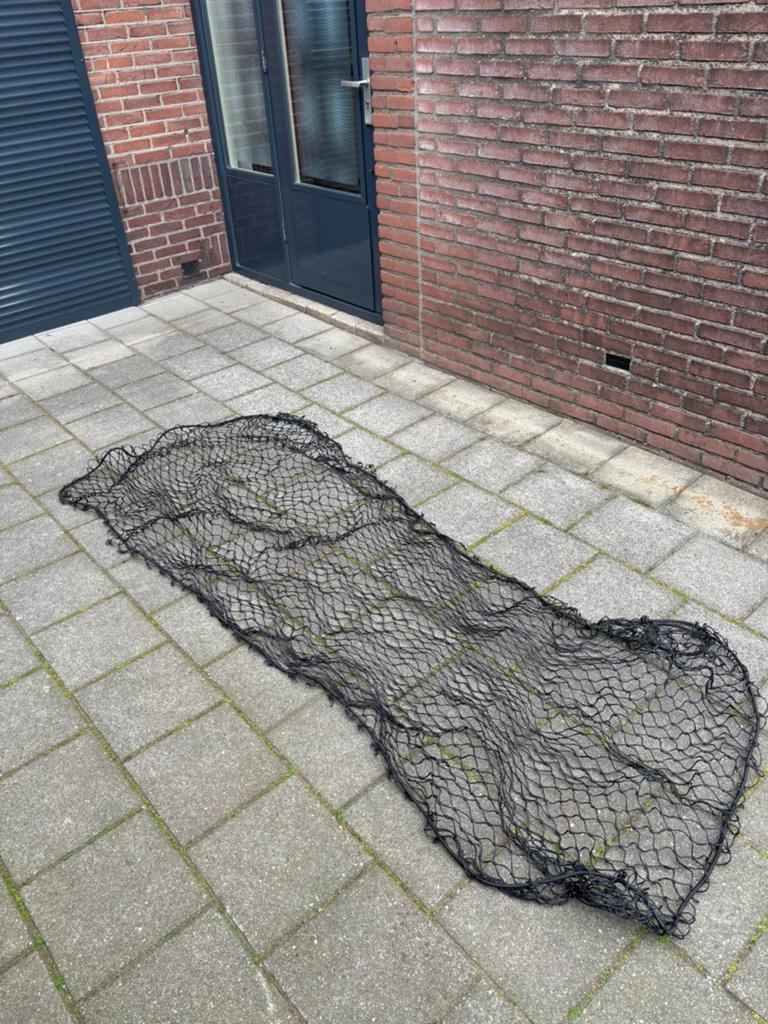 Net voor over de kar, Ophalen