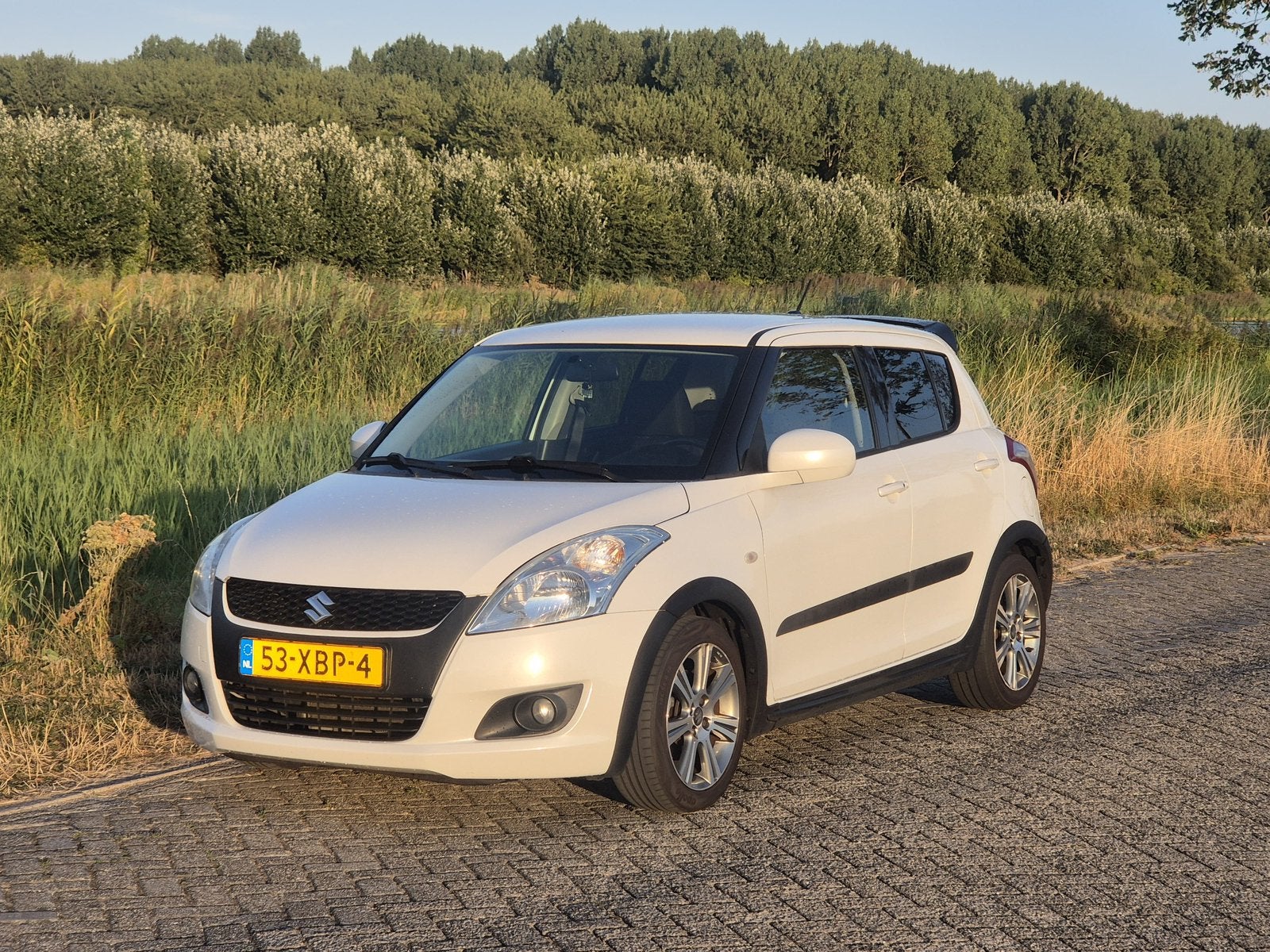 Suzuki Swift 1.2 5-D 2012 Wit | Keyless entry | Full Option, Euro 5, Stof, 4 cilinders, 400 kg