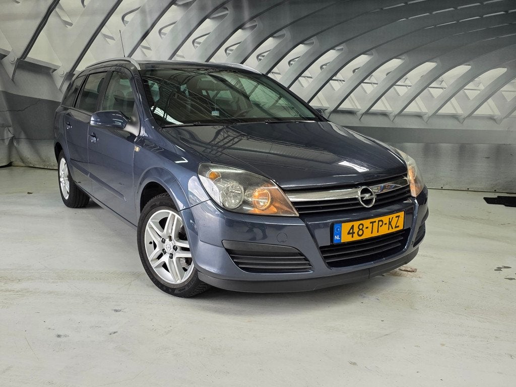 Opel Astra Wagon 1.8 Cosmo Automaat, Auto's, Opel, Stof, Gebruikt, Beige, 4 cilinders