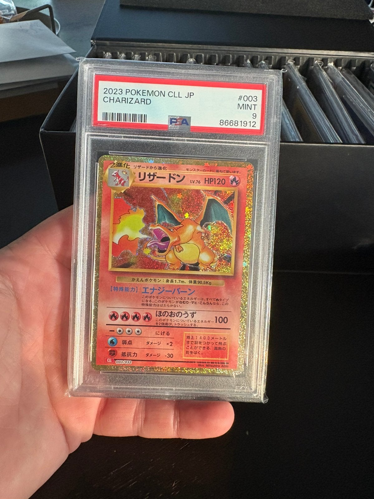 Charizard 2023 psa 9, Ophalen of Verzenden, Zo goed als nieuw, Meerdere kaarten, Foil