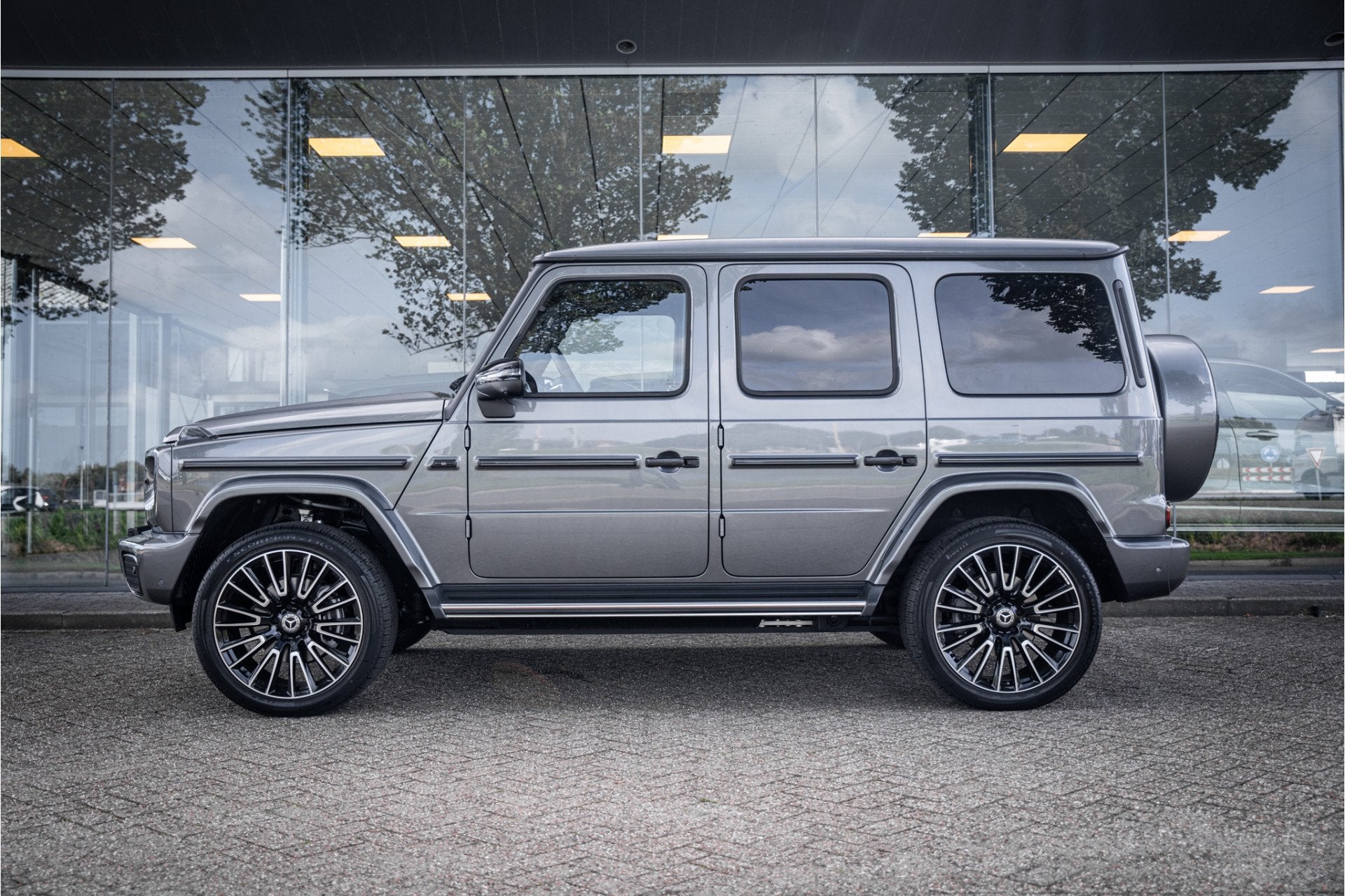 Mercedes-Benz G-Klasse 580 met EQ-Technologie 116 kWh * Burm, Auto's, Automaat, Gebruikt, Zwart, Vierwielaandrijving