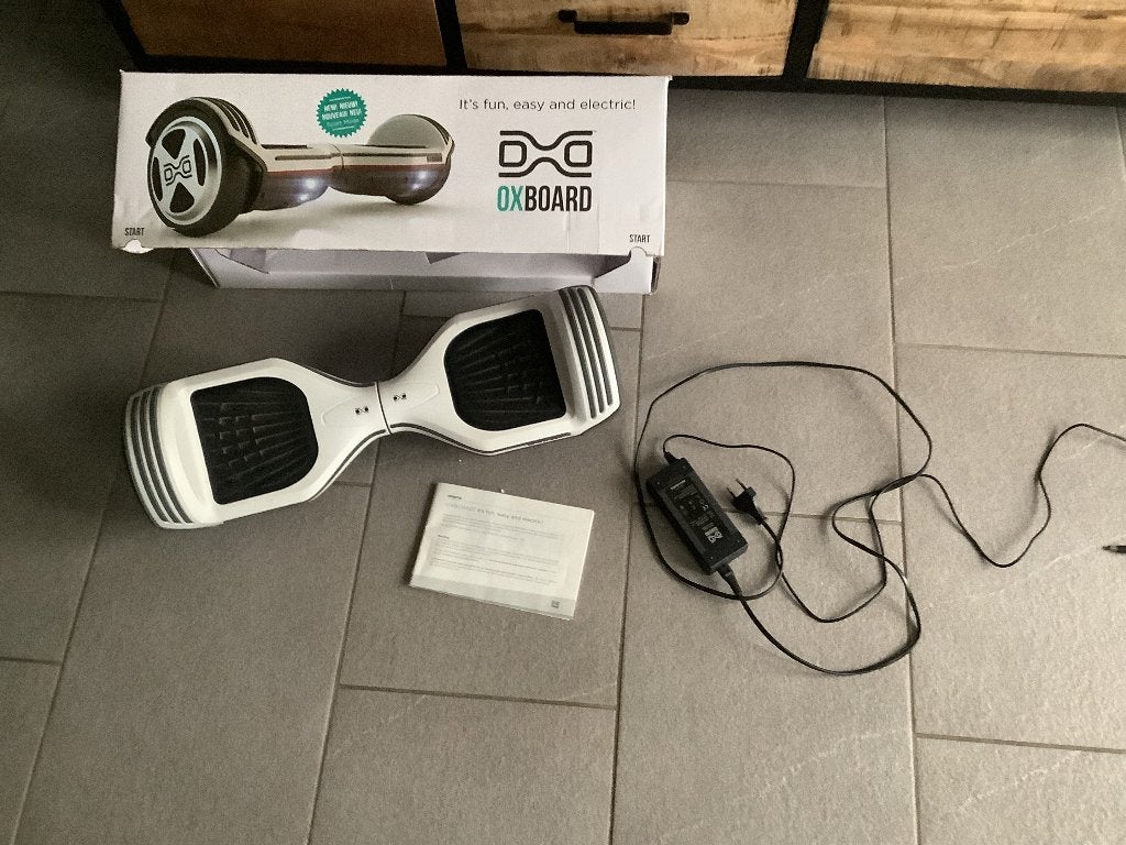 Oxboard compleet met doos, lader en afstandsbediening, Ophalen, Zo goed als nieuw