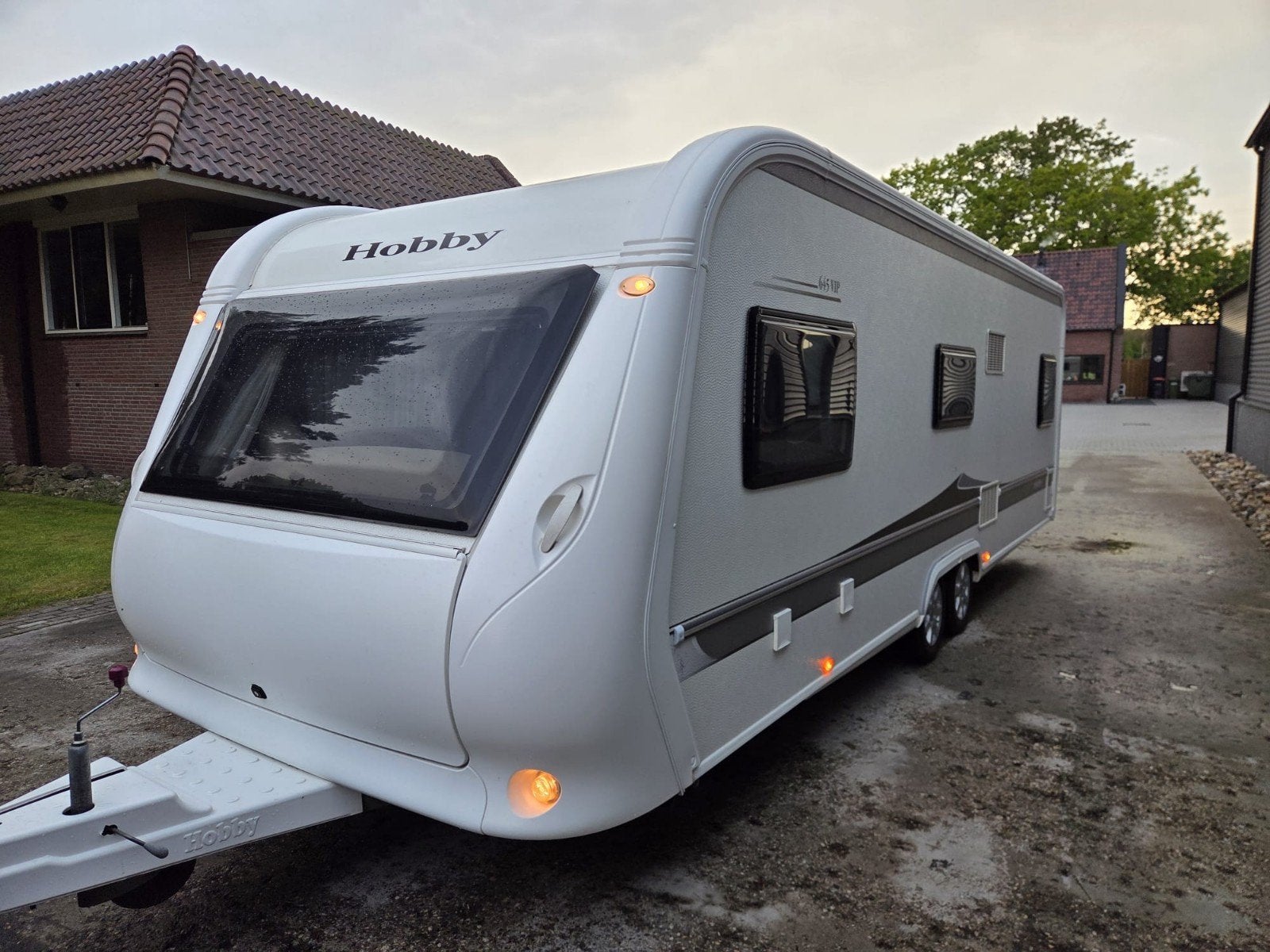 Instapklare Hobby 645 VIP van 2010 Bovag Gekeurd Nw Banden, Caravans en Kamperen, Vast bed, Luifel, Rondzit, Hobby