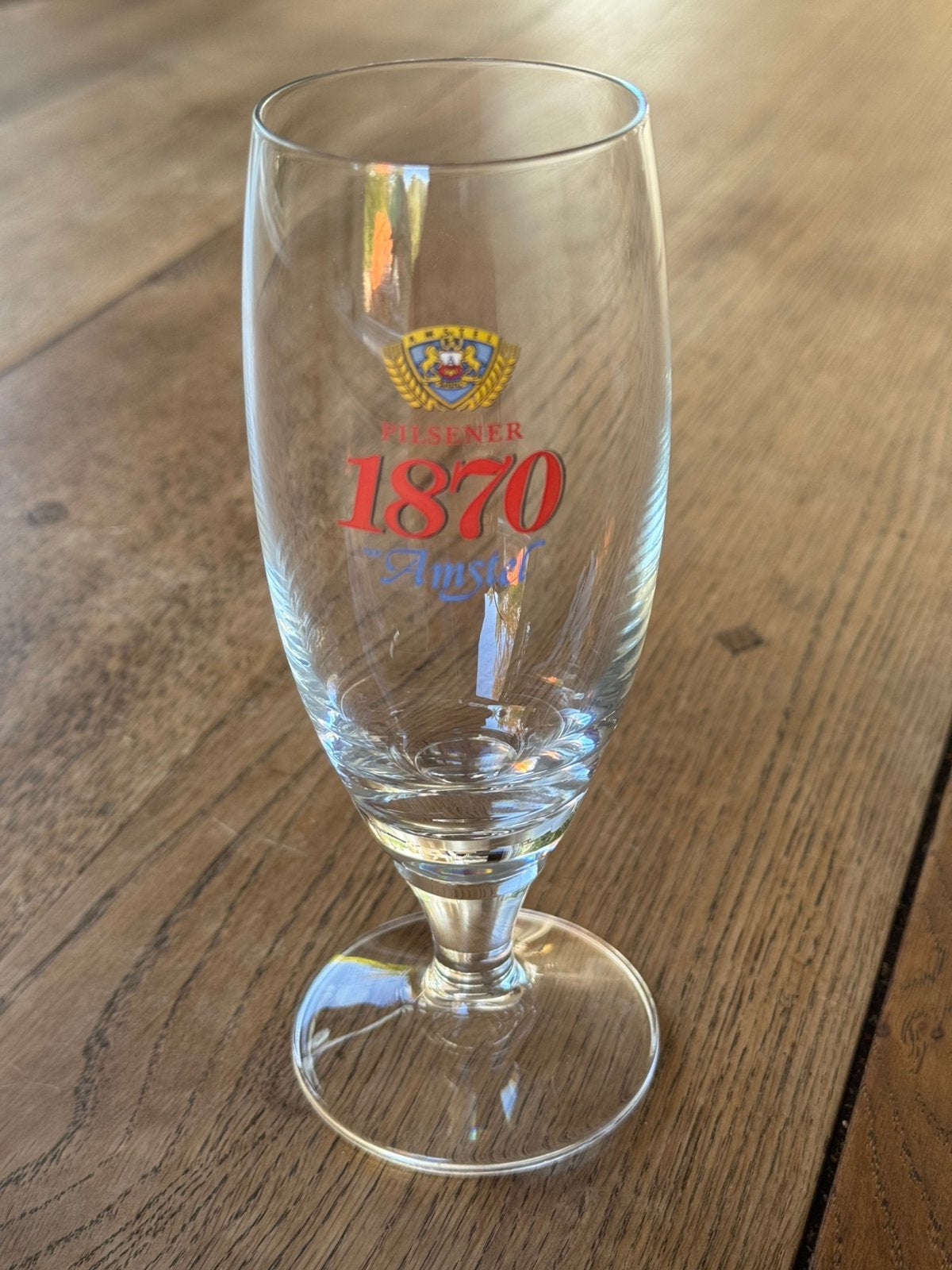 Vintage Amstel 1870 bierglas op voet, Ophalen of Verzenden, Glas of Glazen, Amstel