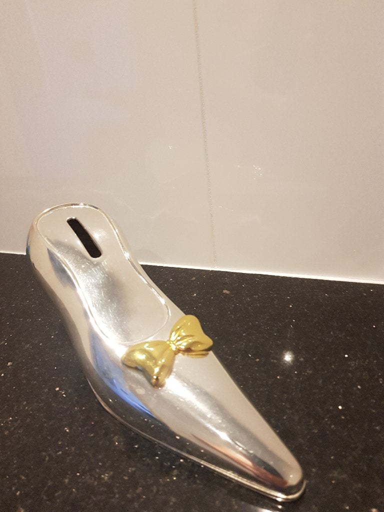 Te koop leuke SPAARPOT in  zilver-goud is in  nieuwstaat !!, Ophalen of Verzenden, Nieuw, Overige materialen, Overige thema's