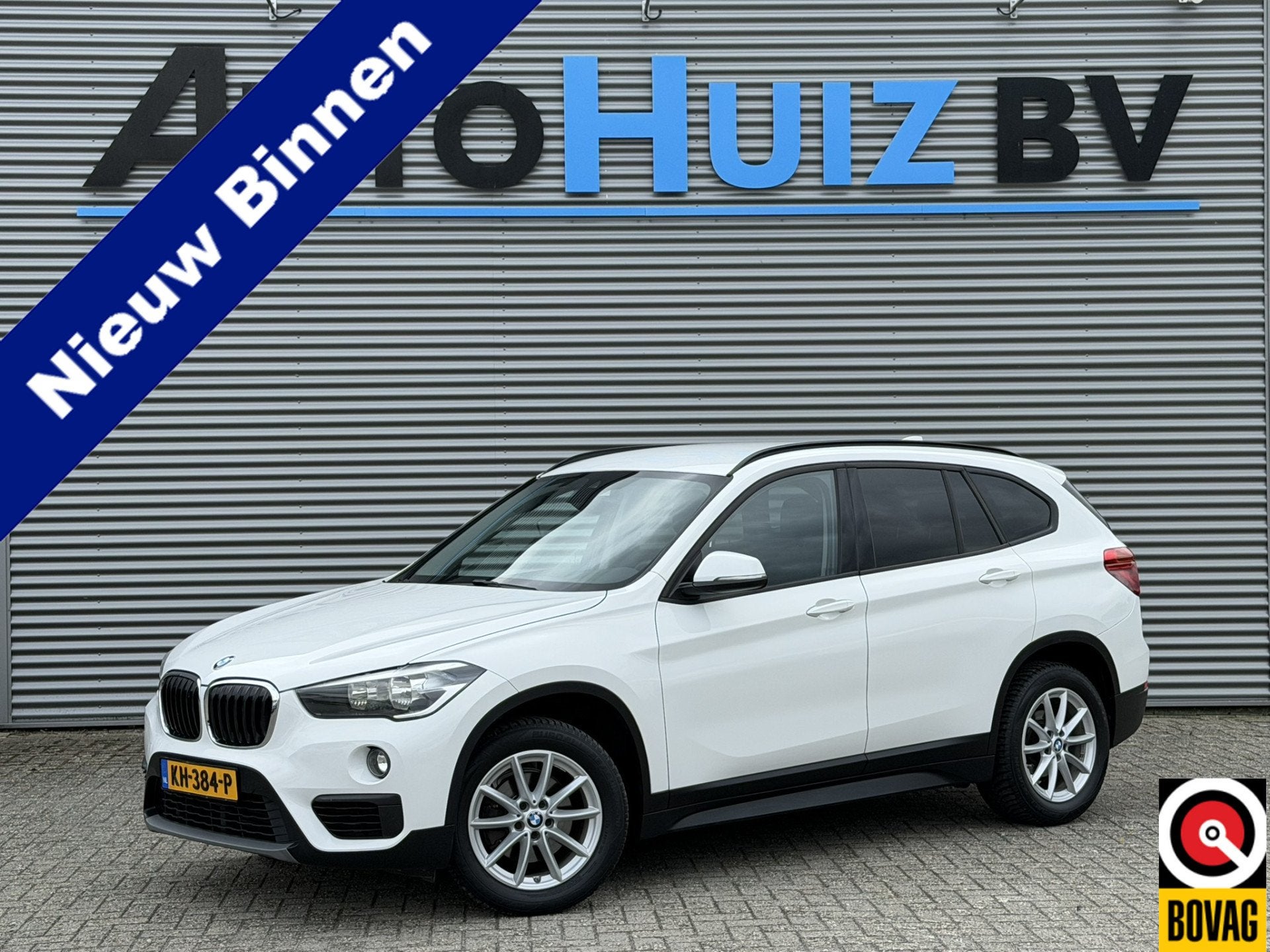 BMW X1 sDrive18i Advantage Navigatie Stoelverwarming Climate, 136 pk, Gebruikt, Met garantie (alle), Wit