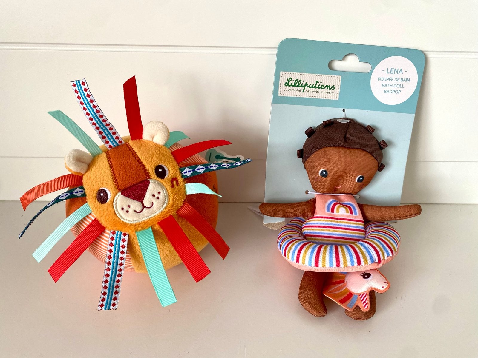 Lilliputiens rammelaar leeuw en badpop Lena, Ophalen of Verzenden, Zo goed als nieuw, Rammelaar, Met geluid