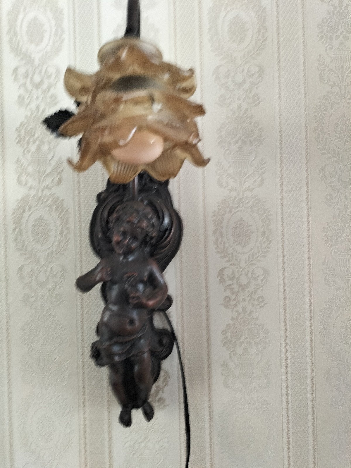 Antieke wandlamp, Ophalen