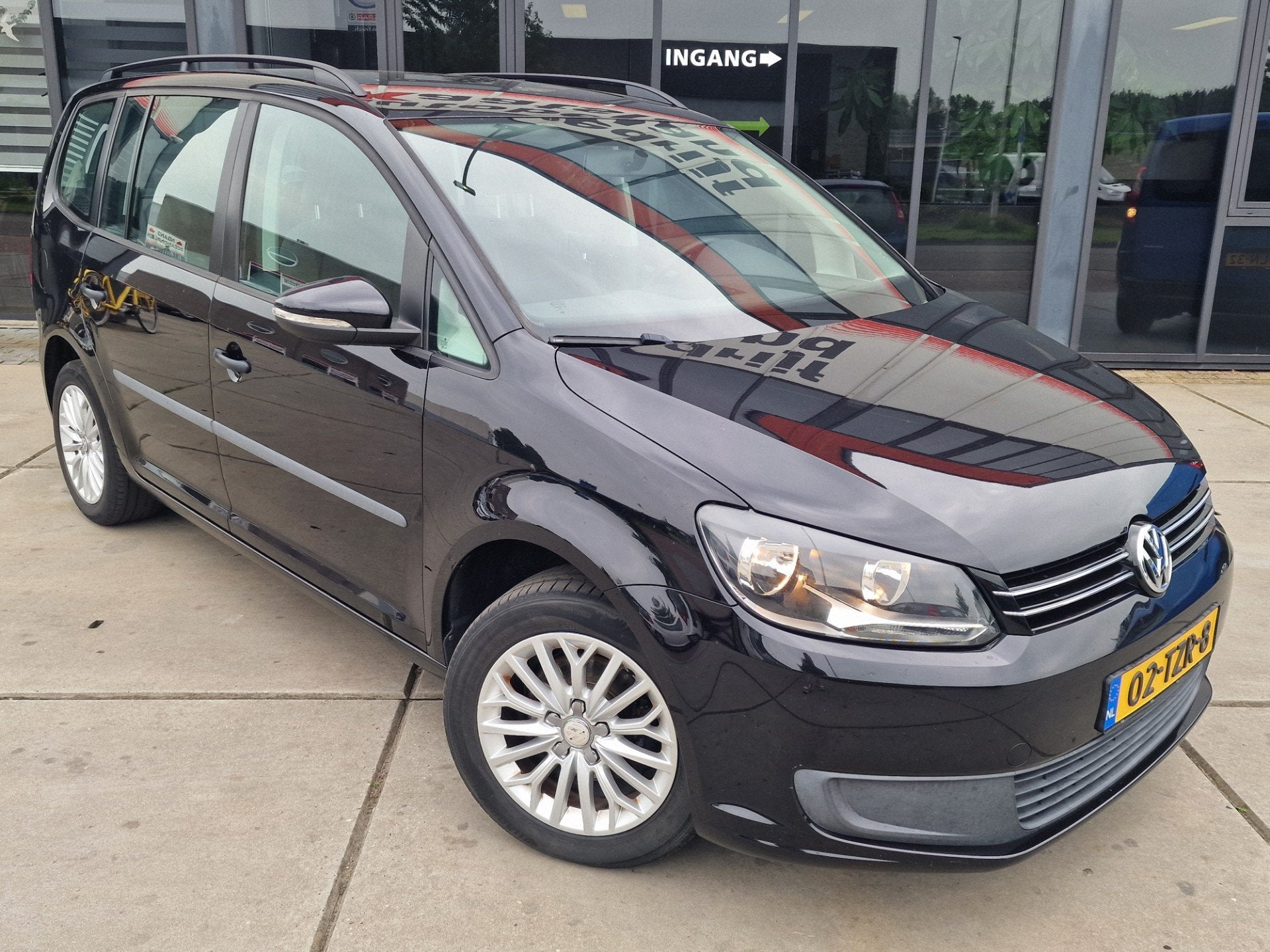 Volkswagen Touran 1.2 TSI Trendline BlueMotion - Navi - Clim, Auto's, Euro 5, Gebruikt, Zwart, 4 cilinders