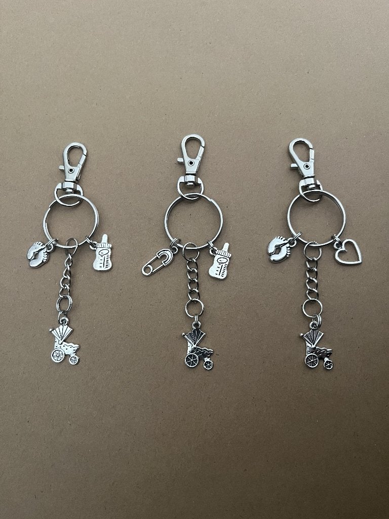 3 verschillende sleutelhangers baby, kinderwagen, flesje, Verzamelen, Ophalen of Verzenden, Nieuw, Overige typen