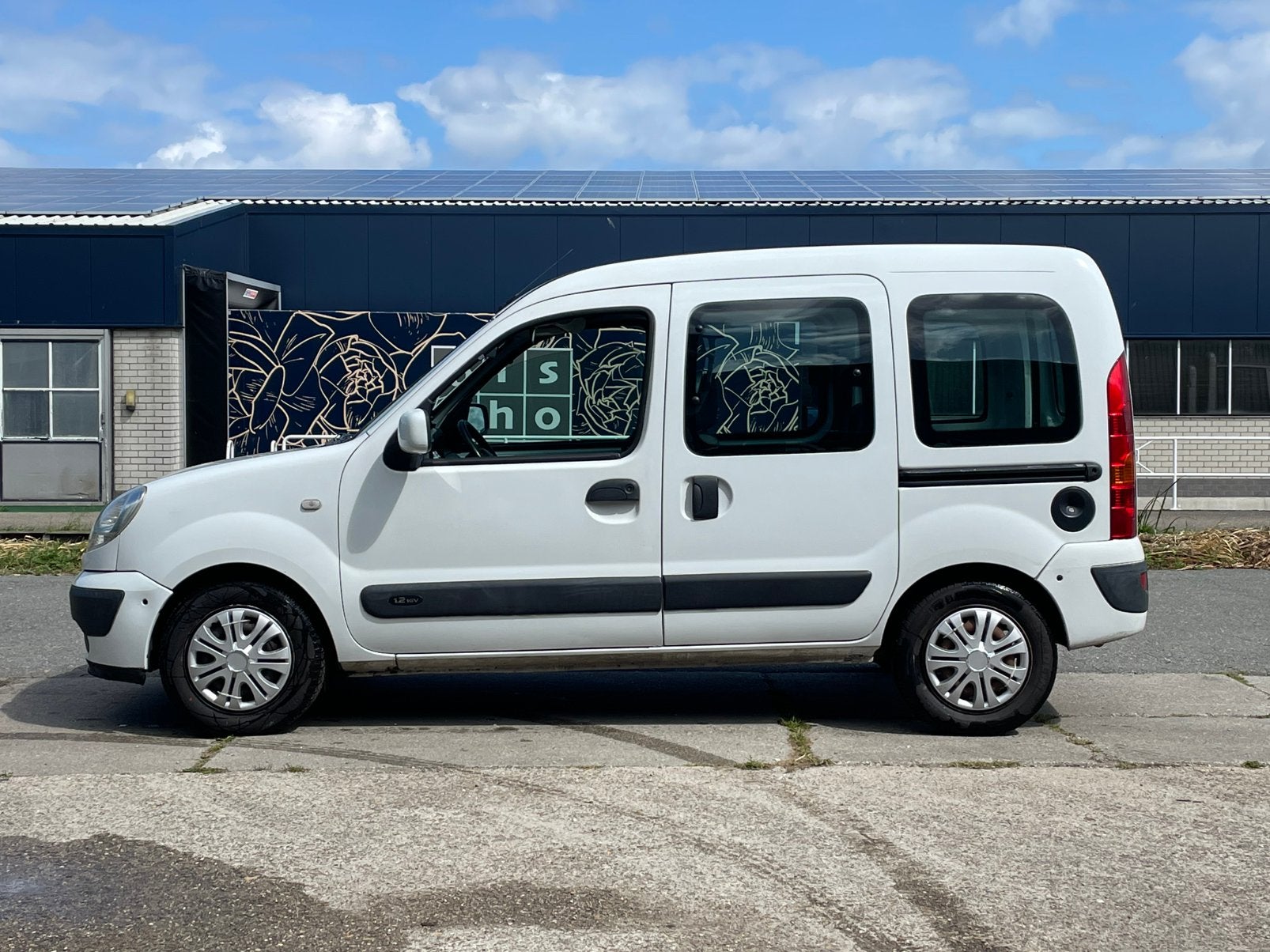 Renault Kangoo 1.2 benzine •AIRCO • SCHUIDDEUR • LEES TEKST!, Auto's, Voorwielaandrijving, 4 cilinders, Wit, Bedrijf