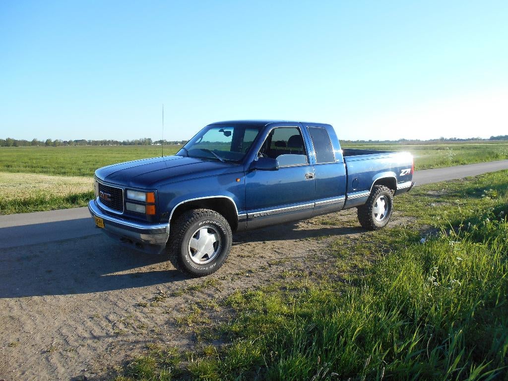 GMC Sierra K1500 Z71 1999 5.7 V8 Automaat 4x4 LPG JAAR APK, Auto's, Automaat, Stof, 8 cilinders, Blauw