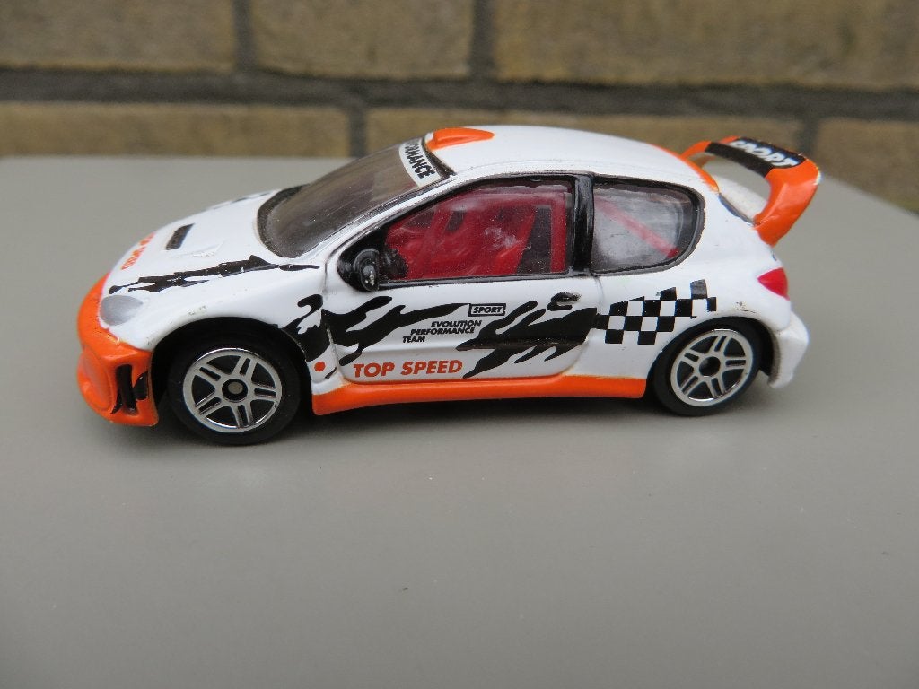 Realtoy Peugeot 206 WRC, Hobby en Vrije tijd, Modelauto's | Overige schalen, Ophalen of Verzenden, Gebruikt, Auto