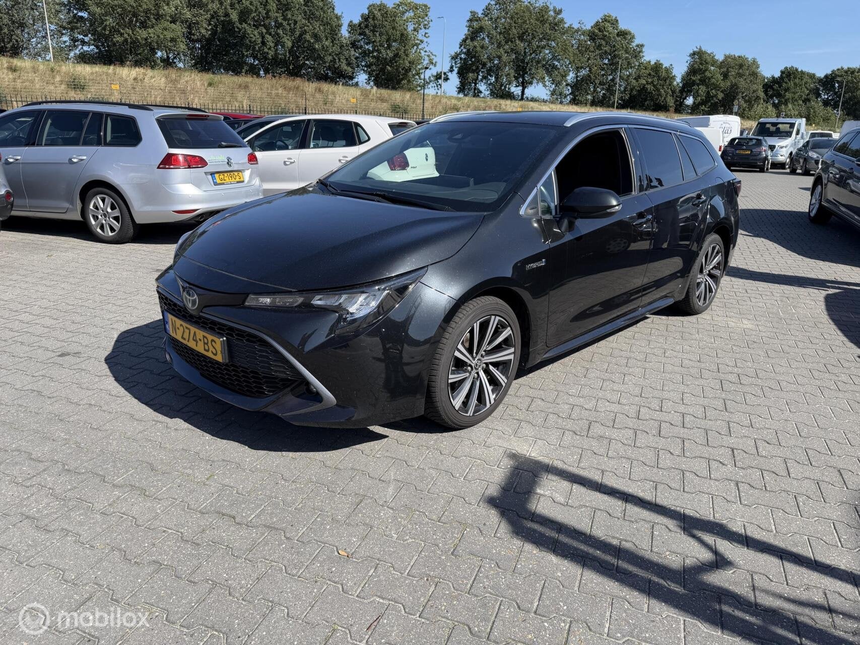 Toyota Corolla Touring Sports 1.8 Hybrid Business Plus BTW, Auto's, 1345 kg, 450 kg, Gebruikt, 4 cilinders