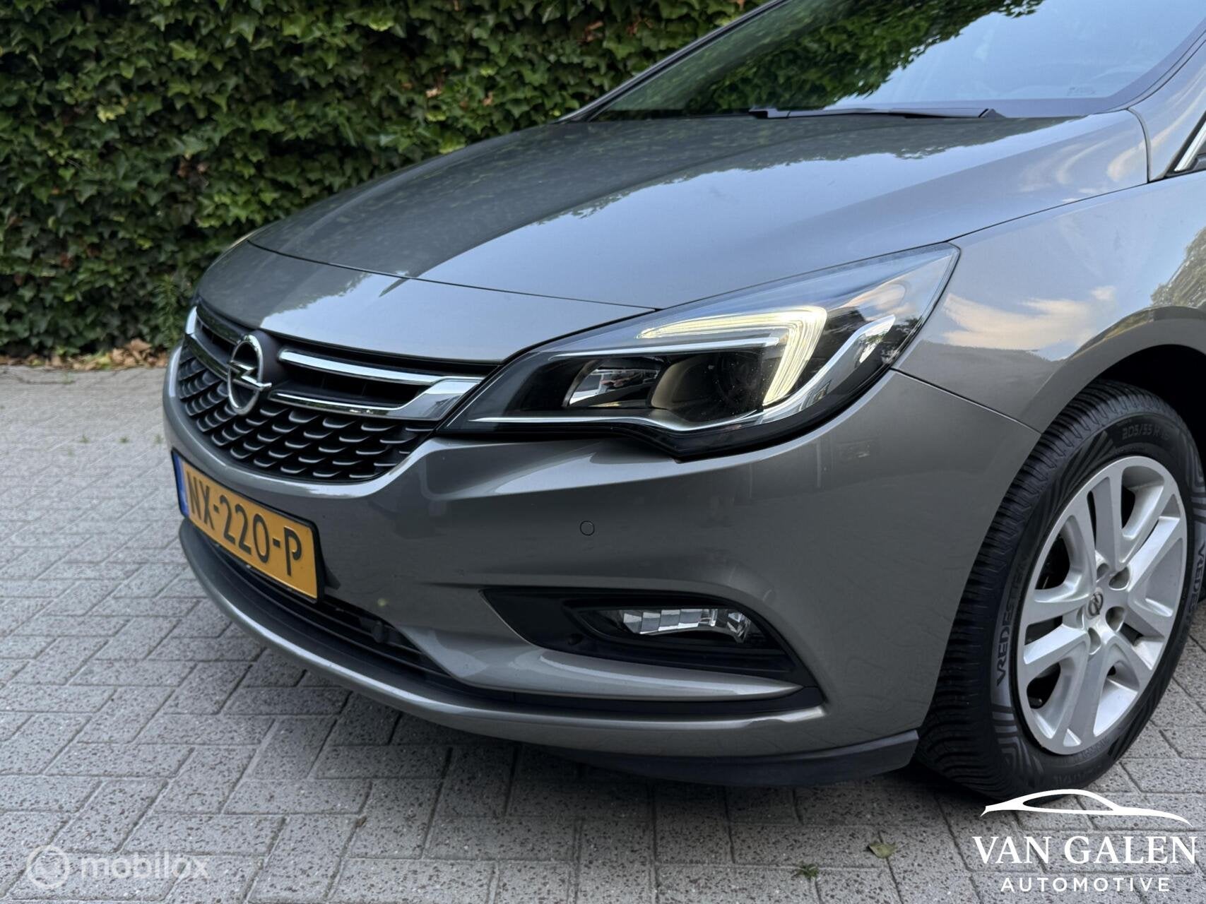 Opel Astra Sports Tourer 1.4 Turbo 150 PK Automaat Navi Cam, Auto's, Opel, 12 maanden, Gebruikt, Origineel Nederlands, 1240 kg