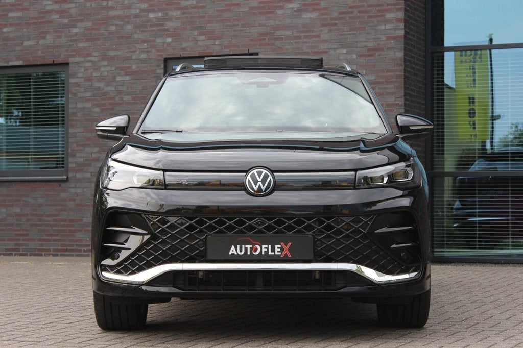 Volkswagen Tiguan 1.5 eHybrid R-Line Edition, Auto's, 150 pk, Leder en Stof, Zwart, Plug-in hybride