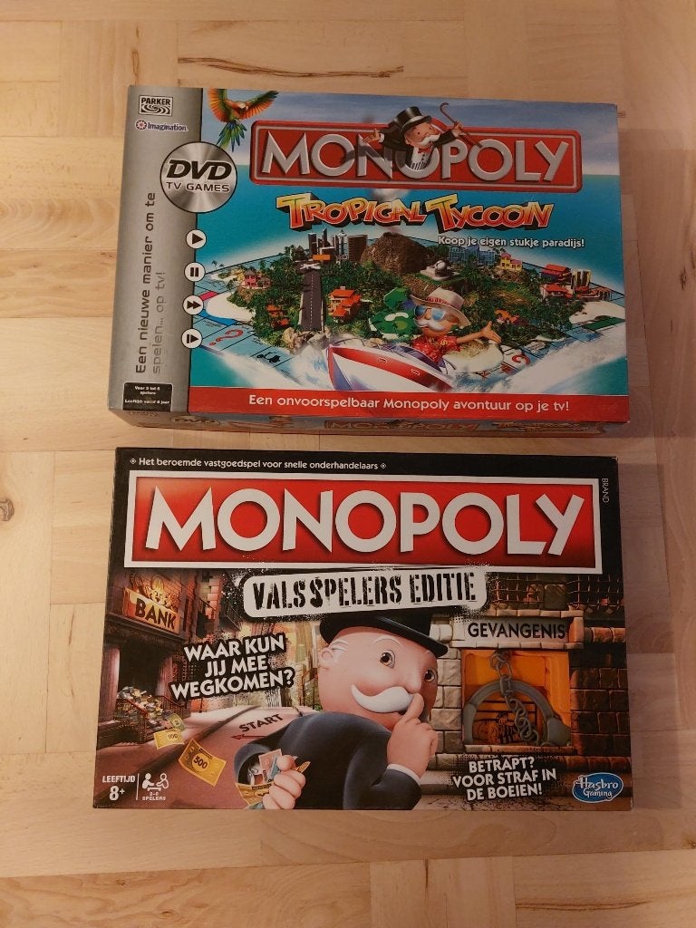 Monopoly - valsspelers editie & tropical tycoon (met DVD), Hobby en Vrije tijd, Een of twee spelers, Ophalen of Verzenden, Zo goed als nieuw