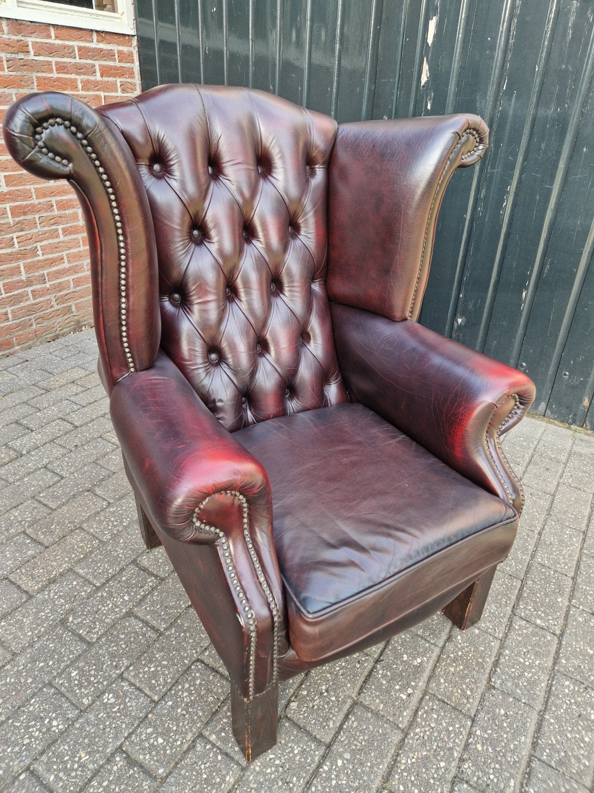 Luxe Chesterfield fauteuil - Bordeauxrood leer, Antiek en Kunst, Ophalen