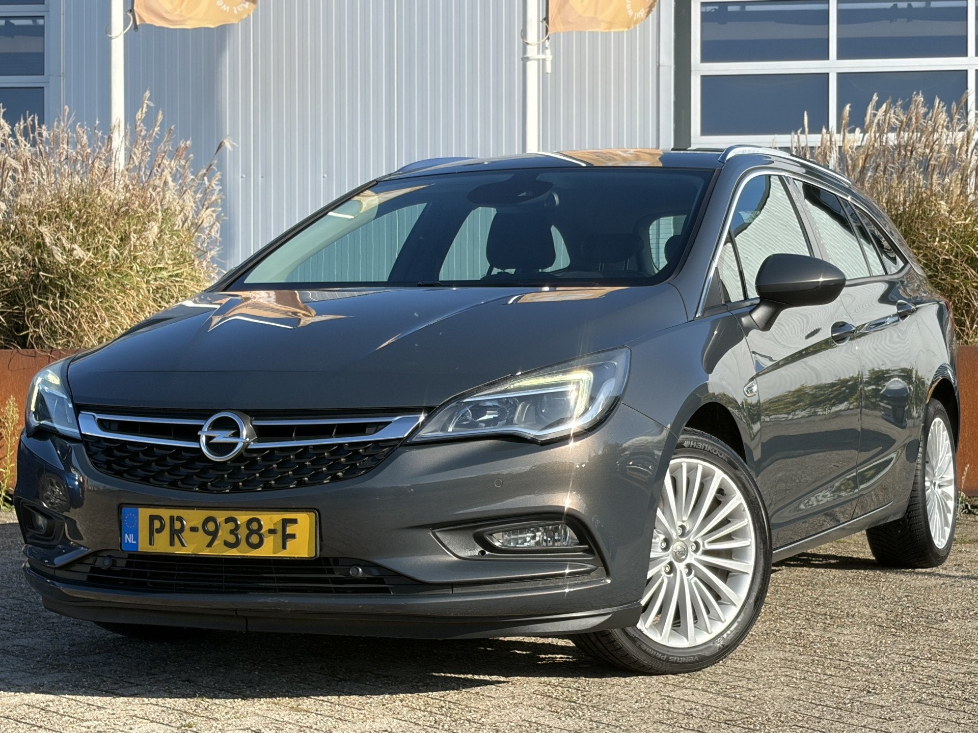 Opel Astra Sports Tourer 1.4 Turbo S/S 125pk | Apple Carplay, Auto's, Voorwielaandrijving, Gebruikt, 4 cilinders, Leder en Stof