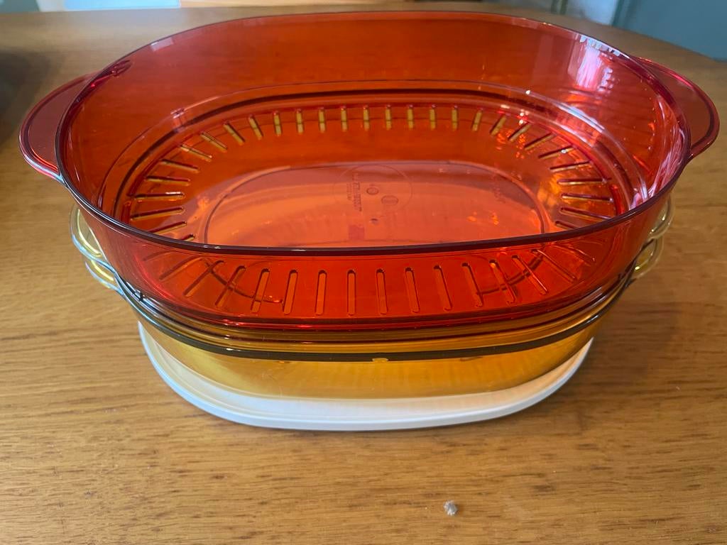Nieuwe Tupperware Micro Ovaal met Vergiet 1,5L, Huis en Inrichting, Keuken | Tupperware, Ophalen of Verzenden, Nieuw, Oranje, Bak of Kom