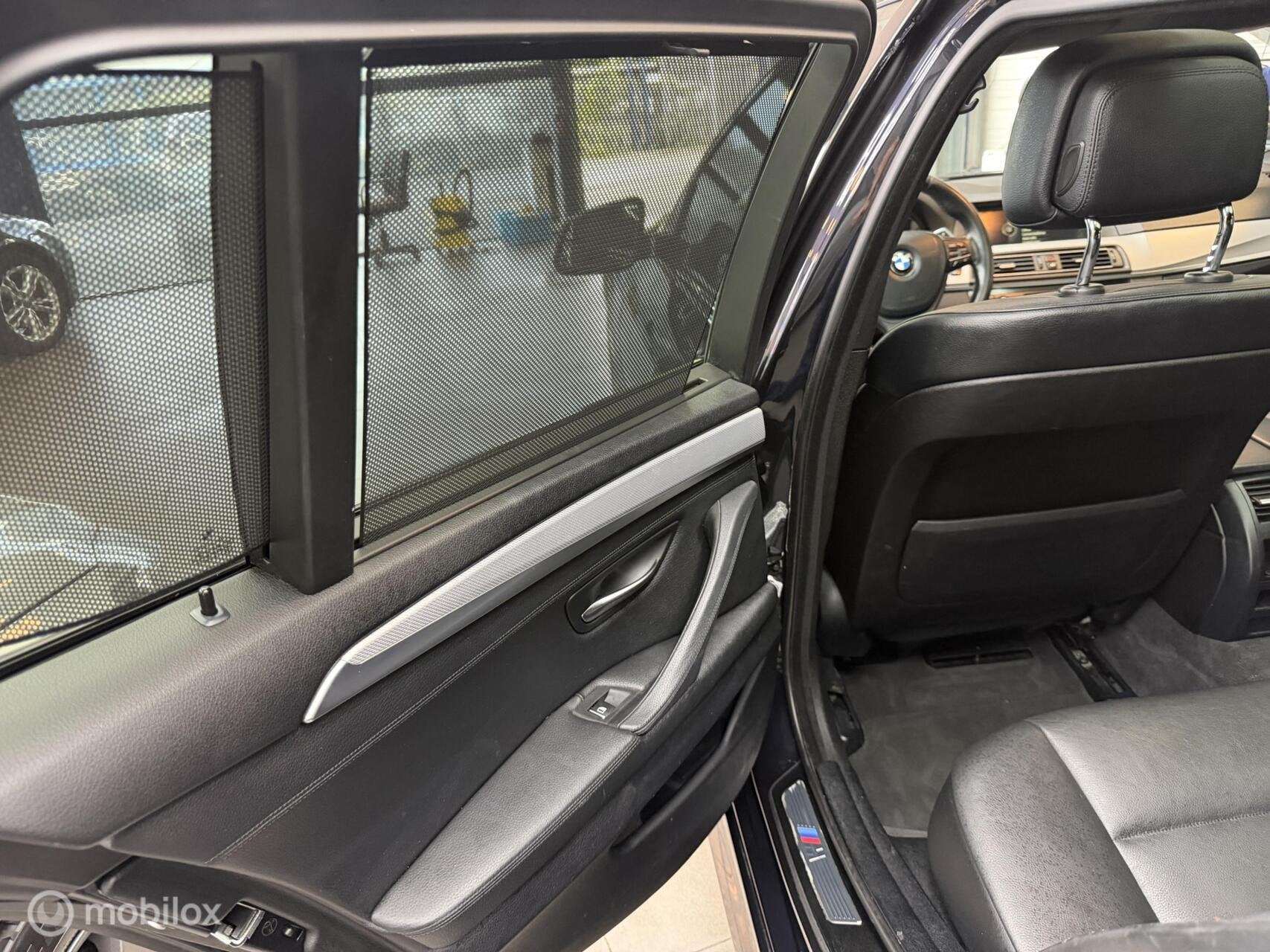 Foto 14 van BMW 5-serie Touring 520i High Executive