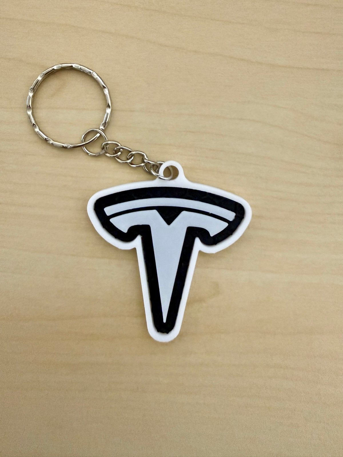 Sleutelhanger Tesla Logo - Zwart/Wit Plastic, Verzenden, Nieuw, Merk