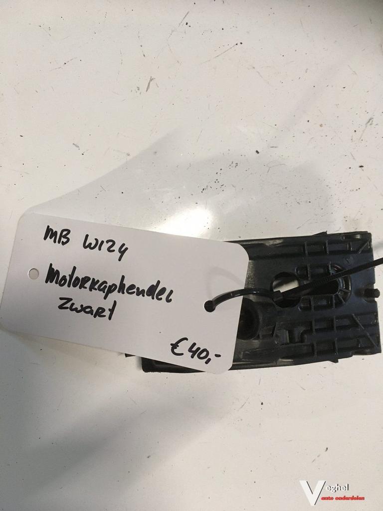 Mercedes w124 Motorkaphendel  in het zwart   origineel merce