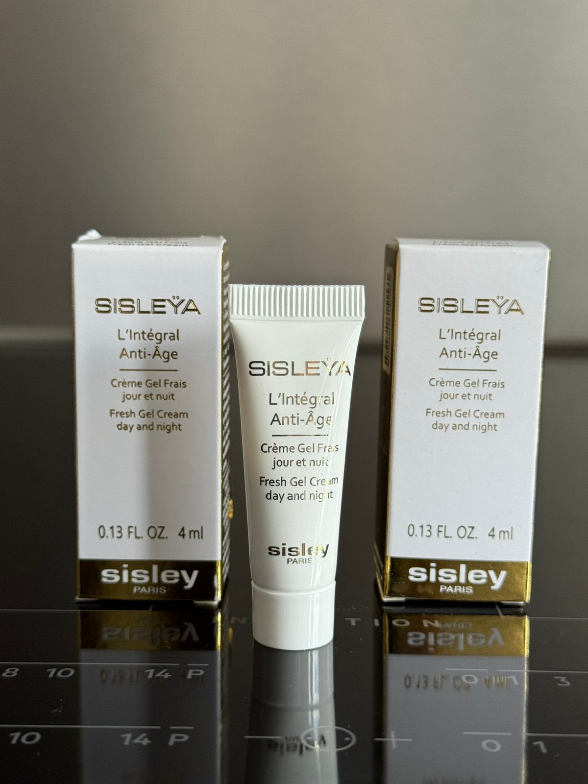 Sisley sisleya L’integral gel cream day and night 2x4ml, Ophalen of Verzenden, Nieuw, Gehele gezicht, Verzorging