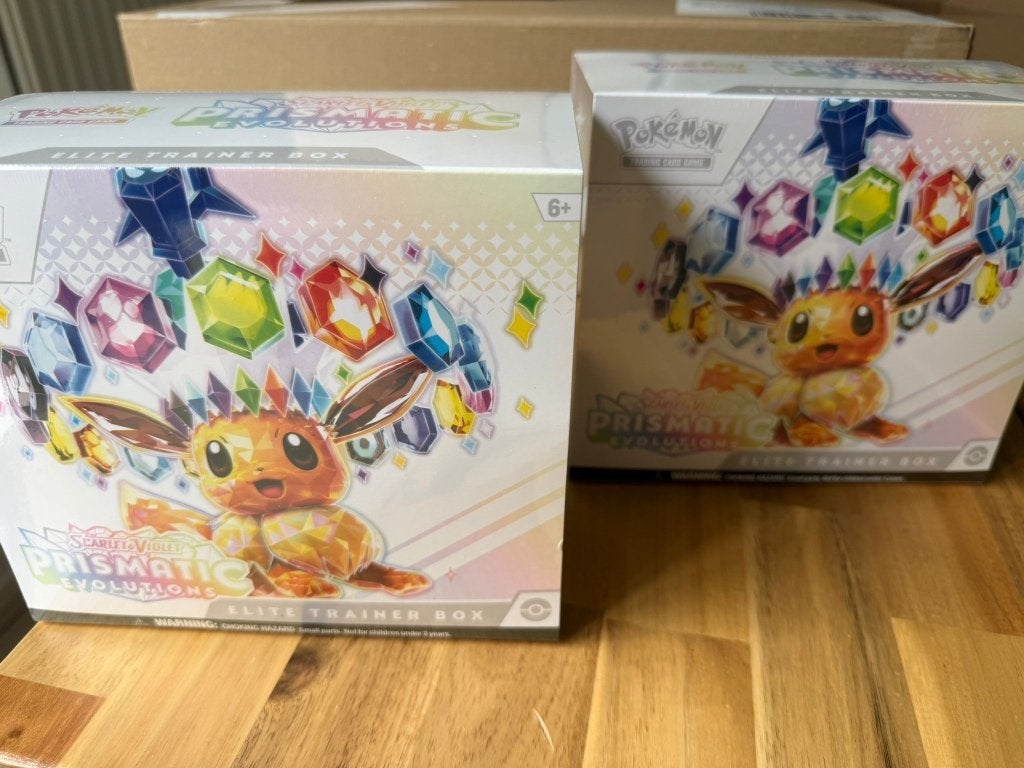 Prismatic Elite Trainer box 155 euro!, Ophalen, Nieuw, Starterdeck, Foil