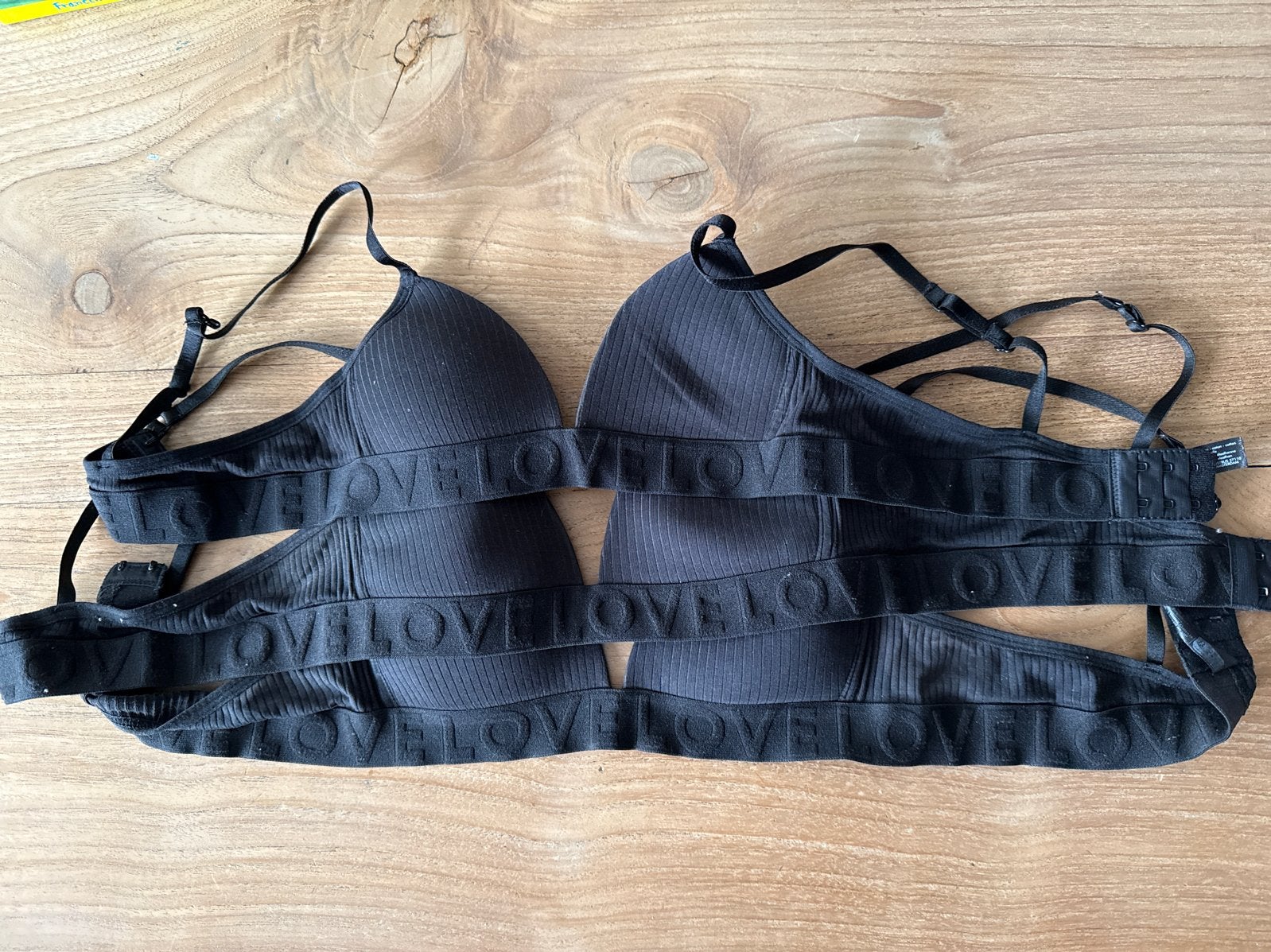 3x zwarte Hema BH met 'LOVE' bandjes 70AA en 75AA, Ophalen of Verzenden, Zwart, BH