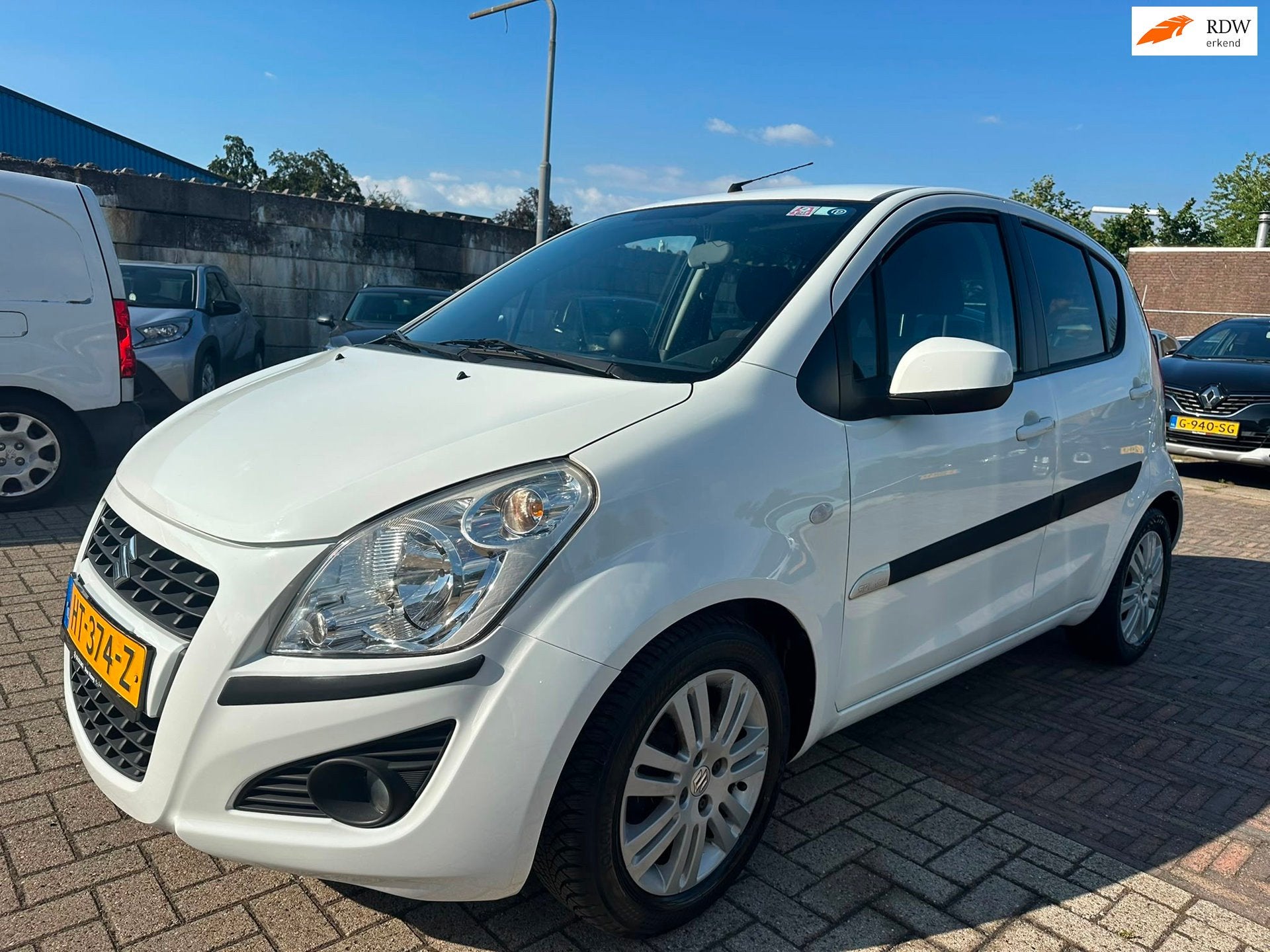 Suzuki Splash 1.2 Exclusive AUTOMAAT/ AIRCO/ HOGE INSTAP!, Stof, 4 cilinders, Elektrische ramen, Wit
