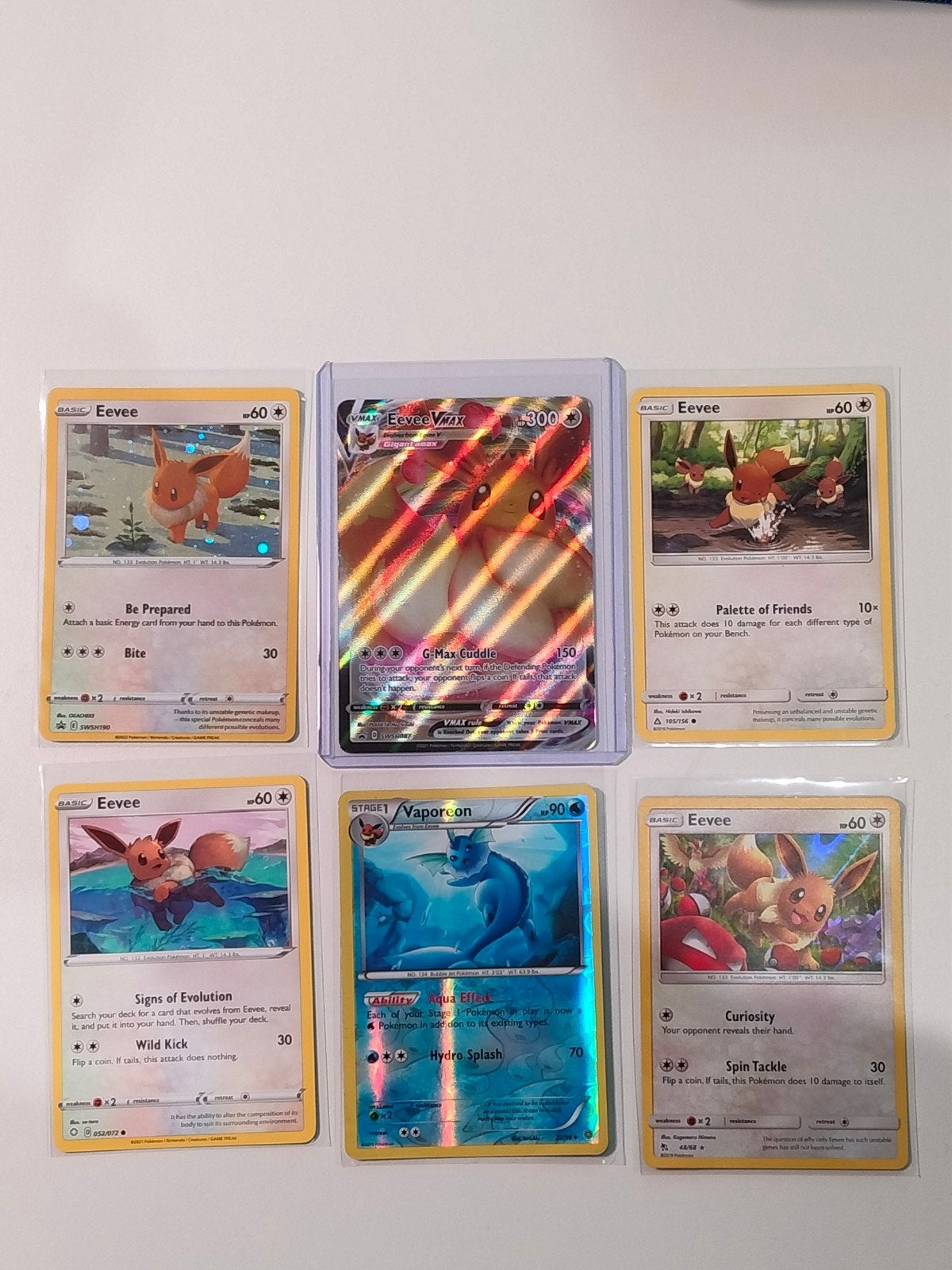 Pokémon kaarten: Vaporeon, Eevee VMAX en meer (beschadigd), Verzenden, Gebruikt, Meerdere kaarten, Foil