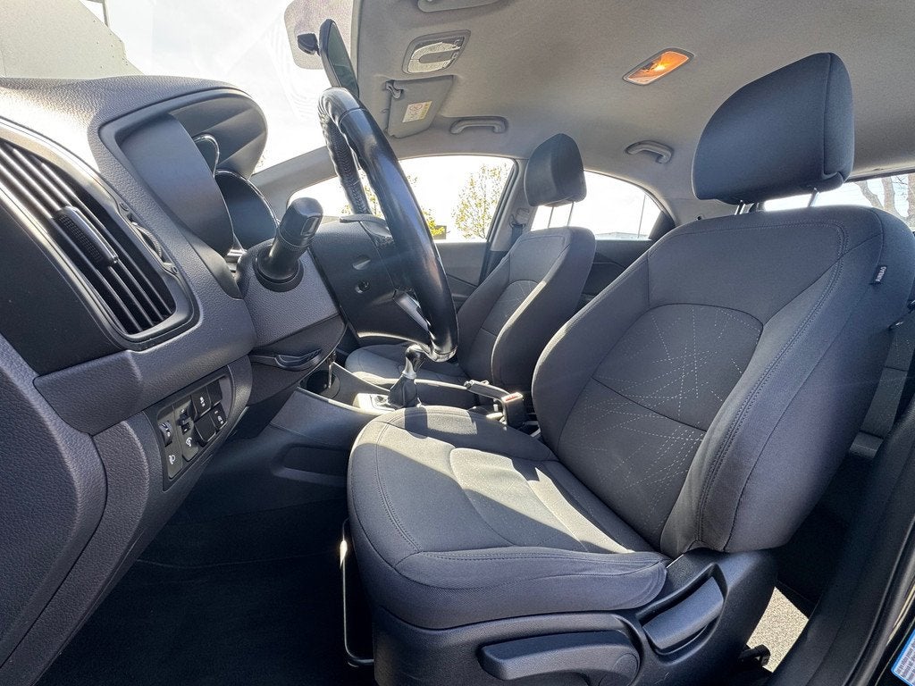 Kia Rio 1.2 CVVT BusinessLine AIRCO|CRUISE|PDC|NW.KOPPELING|, Auto's, 4 cilinders, Zwart, Origineel Nederlands, Bedrijf